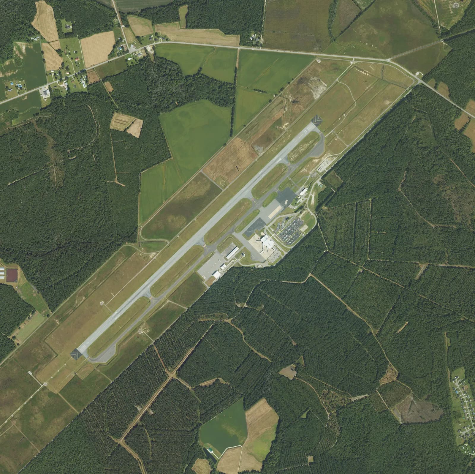 2022 USDA NAIP aerial of Albert J. Ellis Airport (OAJ) in Richlands, North Carolina, showing the single 5/23 runway and midfield passenger terminal.