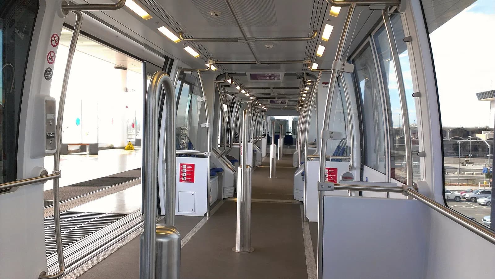 Interior of an Oakland Airport Connector car at Oakland International Airport station in March 2015