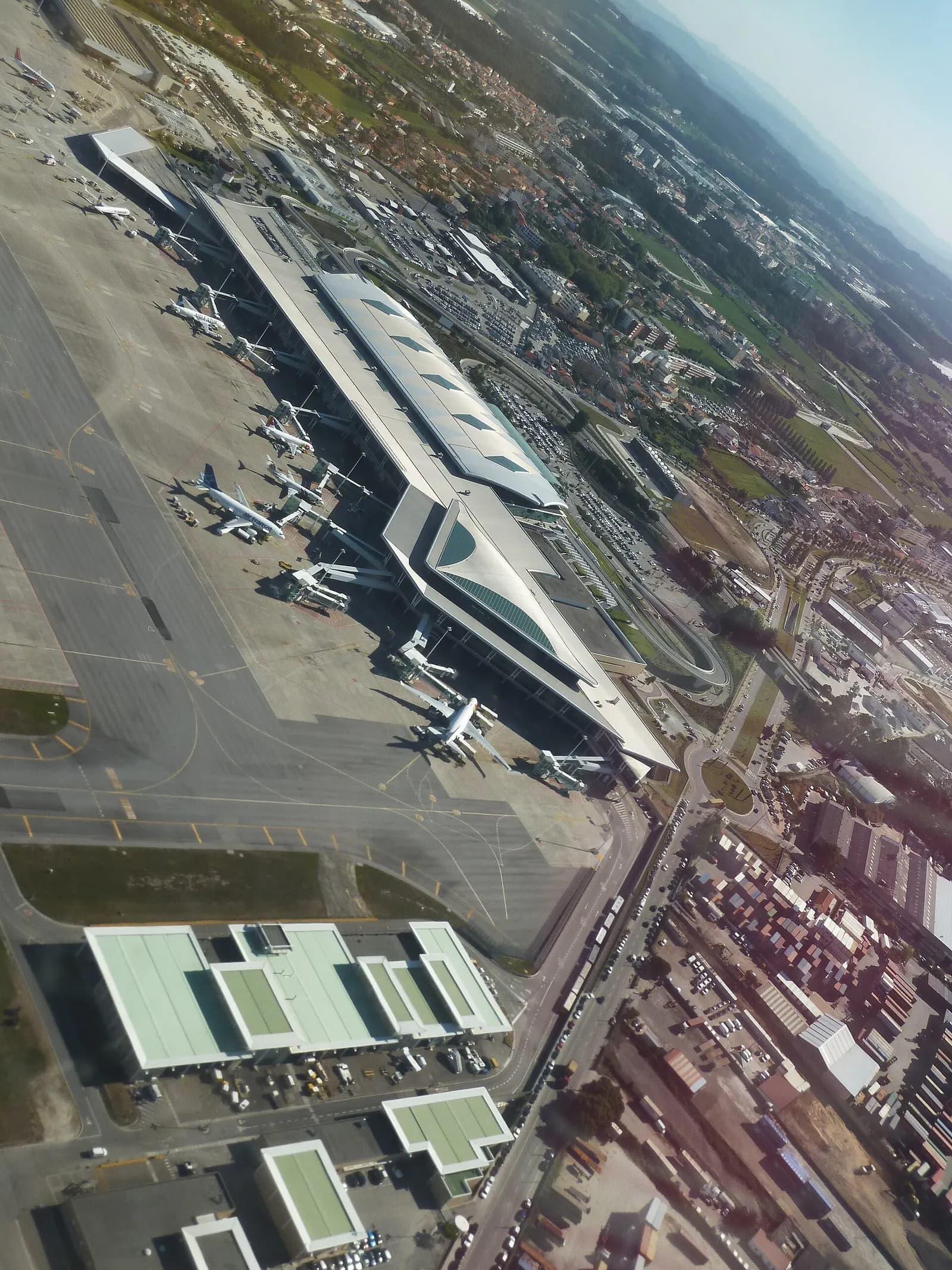 Taking off from Porto's Francisco Sã Carneiro Airport. A view to the main apron and the passenger building.