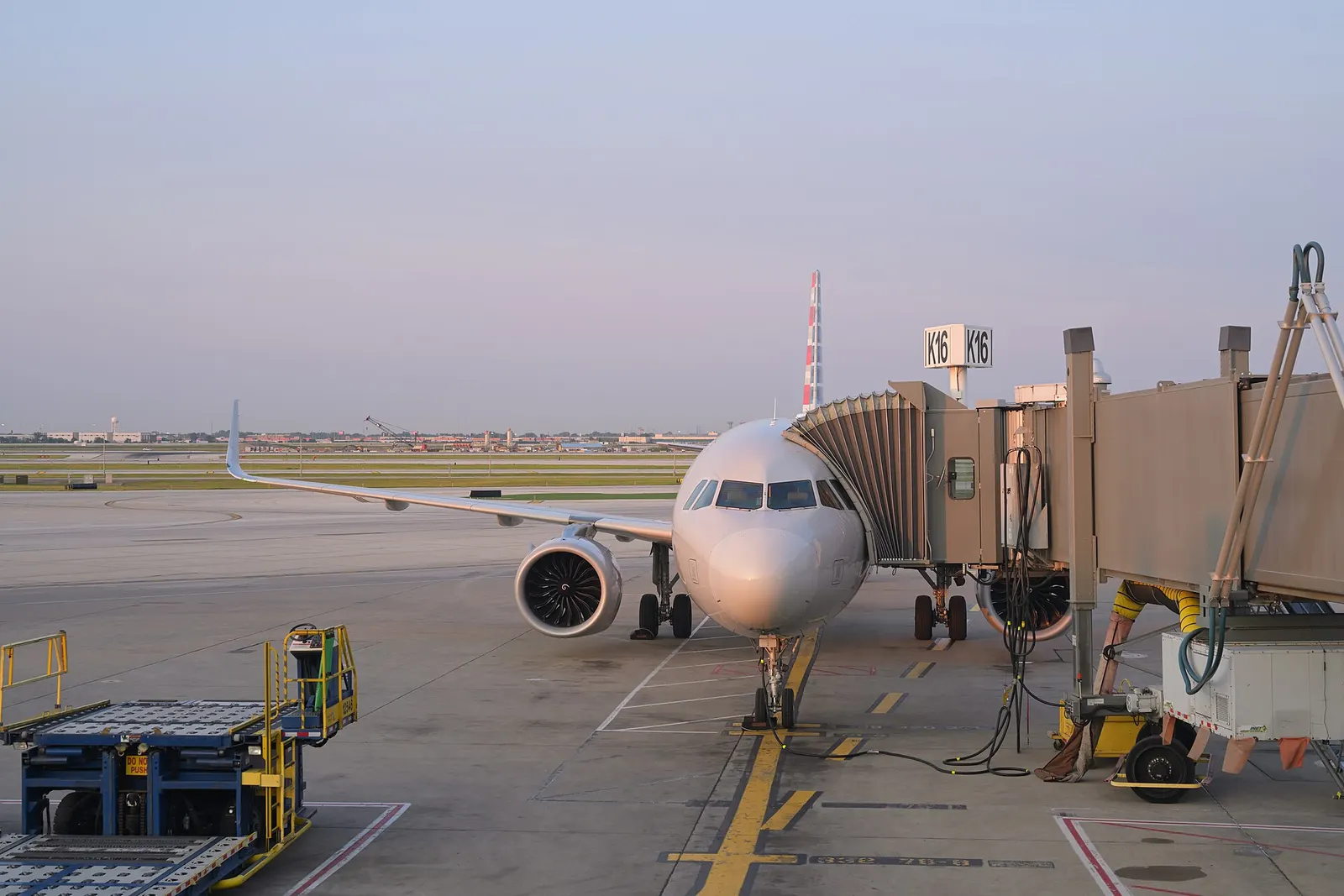 An American Airlines Airbus A321neo parked at gate K16 at Chicago O'Hare International Airport
