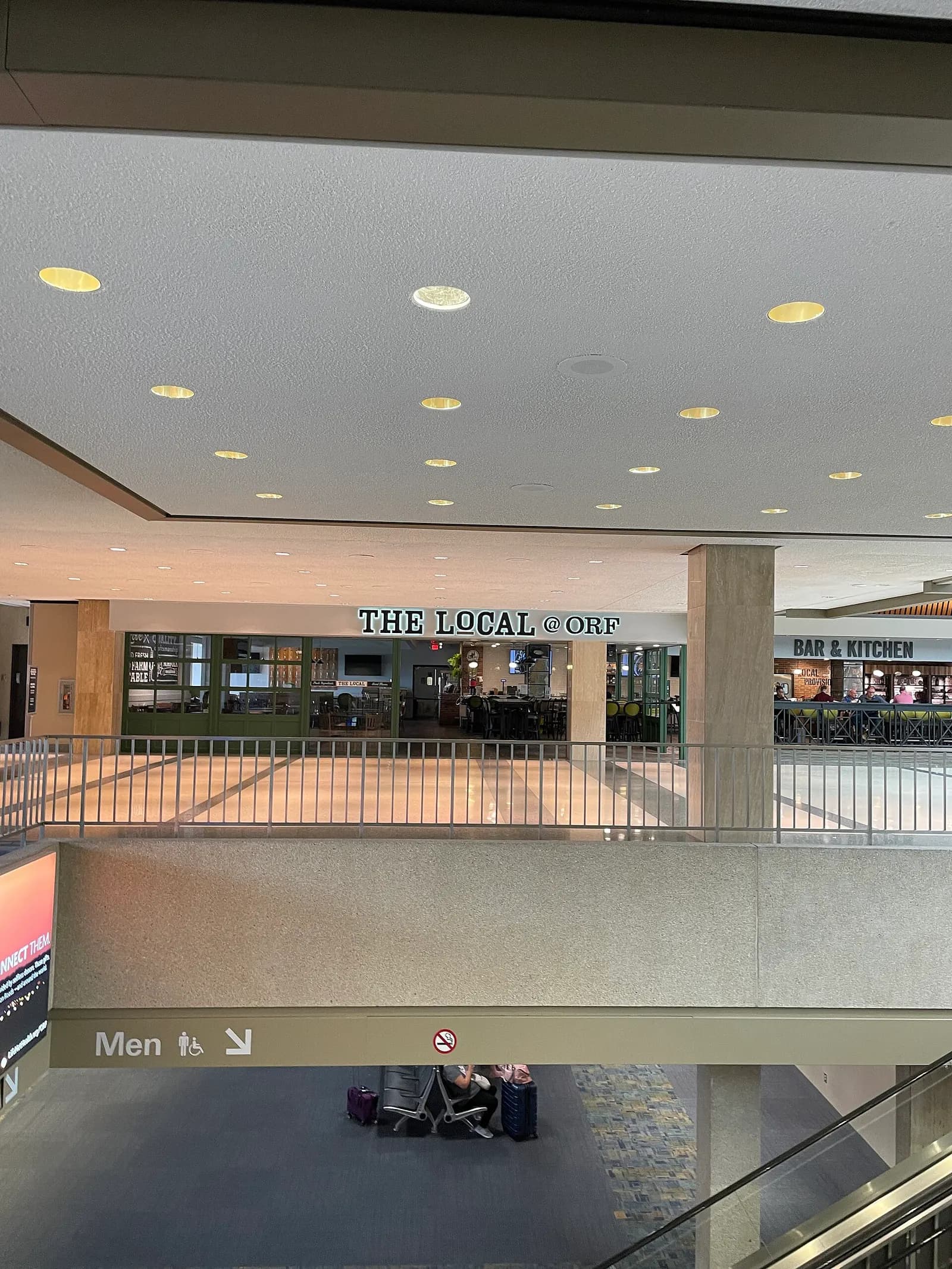The Local @ ORF restaurant on the Main Lobby mezzanine, seen from the upper walkway above the restrooms.