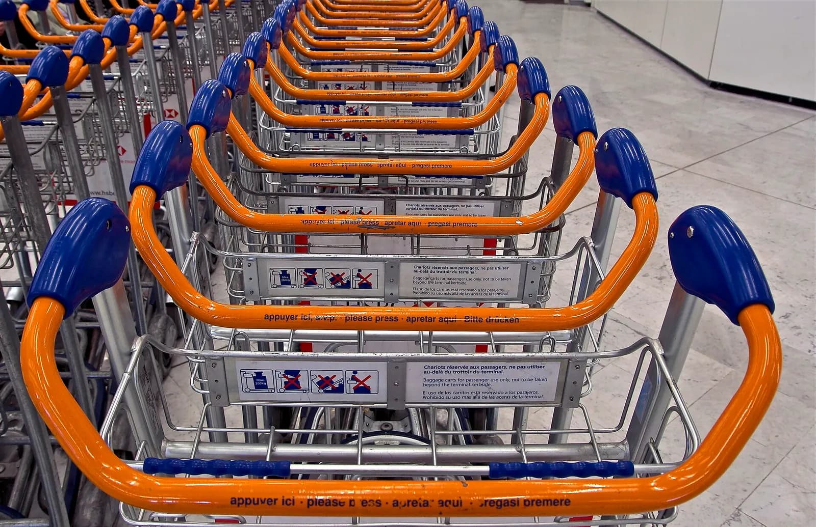 Baggage carts, perspective, Orly International Airport.