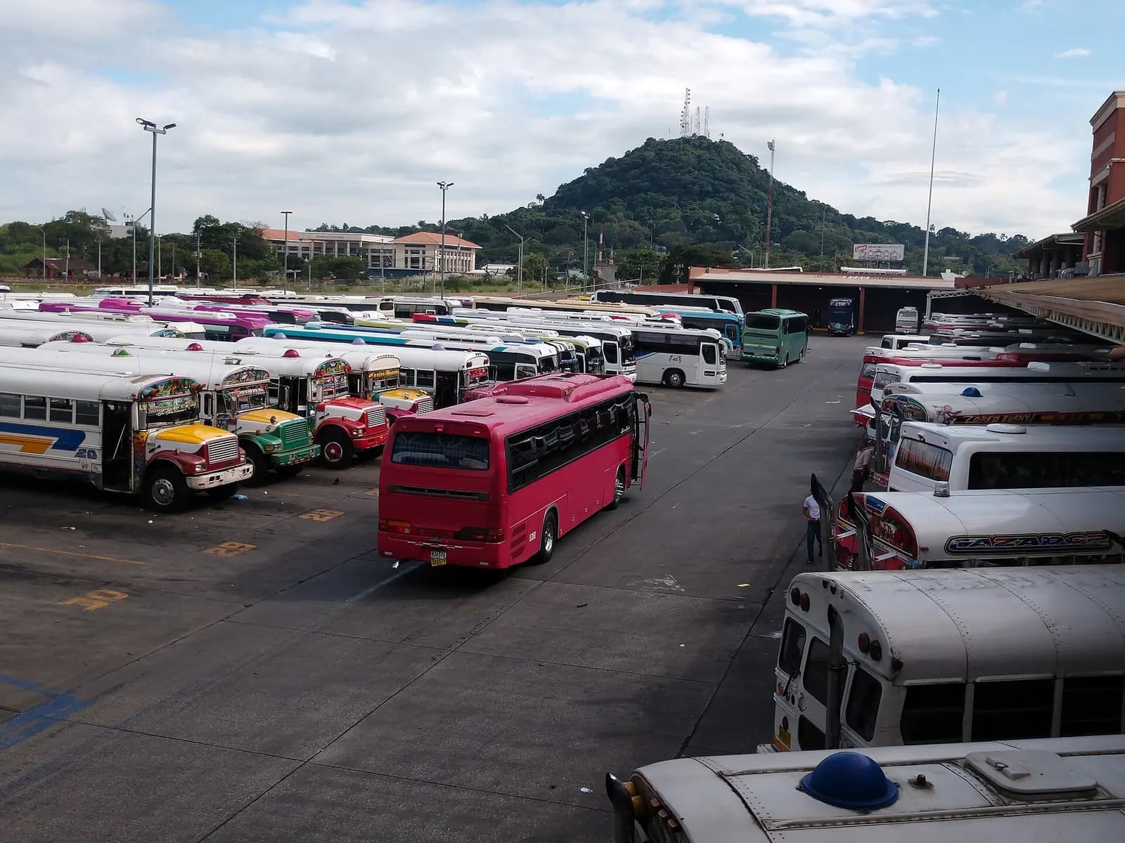Rows of intercity coaches parked in bays at the Gran Terminal del Transporte.
