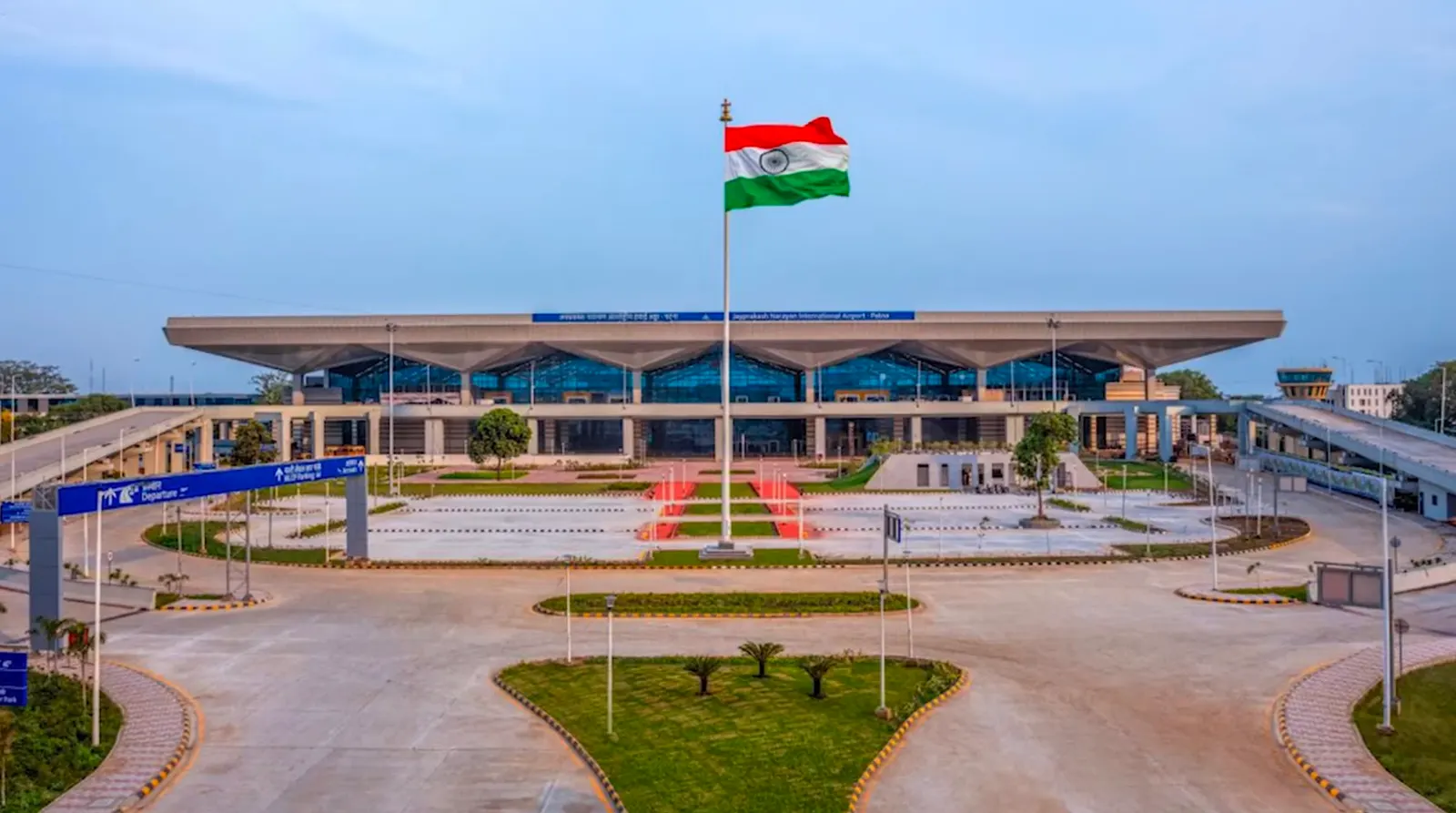 New Jayprakash Narayan International Airport terminal landside façade with Indian flag — Patna (June 2025)