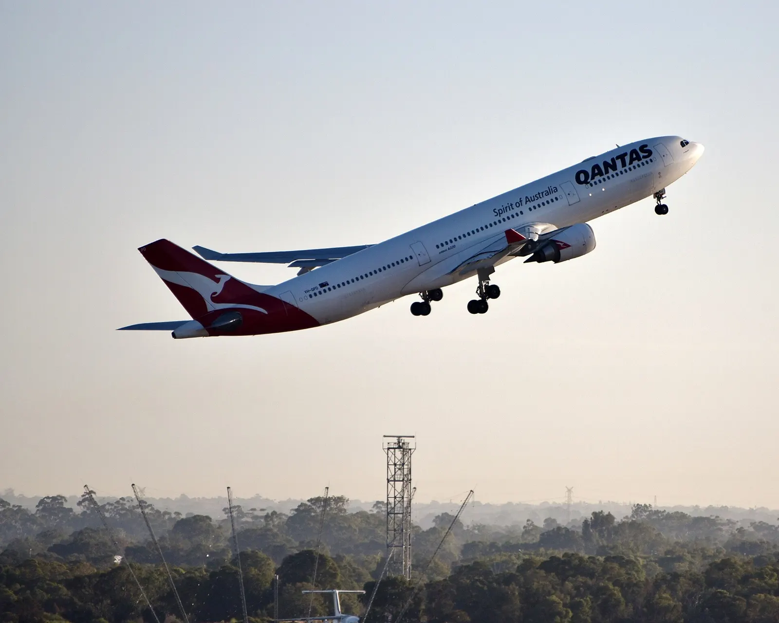Qantas Airbus A330 taking off from Perth Airport runway 06