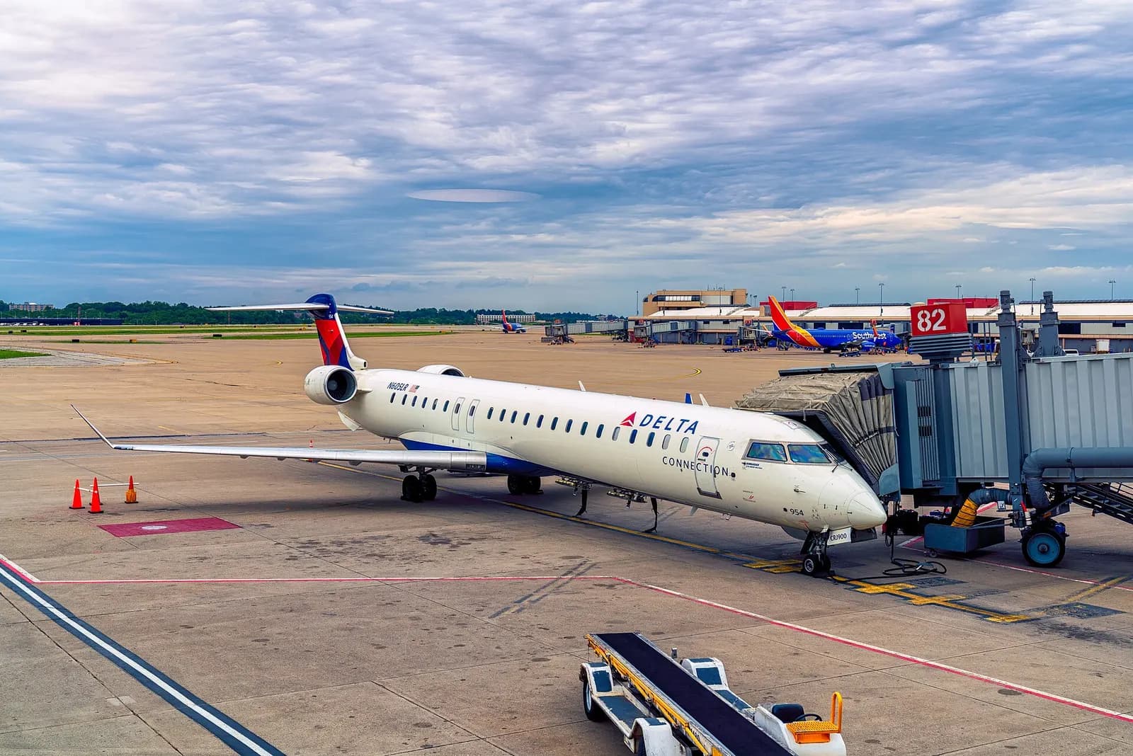 N605LR, a 2008 Bombardier Canadair Regional Jet CRJ-900 plane operated by Delta Air Lines Connection, parked at Gate 82 (D Concourse) at Pittsburgh International Airport in Pittsburgh, Pennsylvania, on June 15, 2019. The plane is pictured here shortly after arrival from JFK, before heading back towa