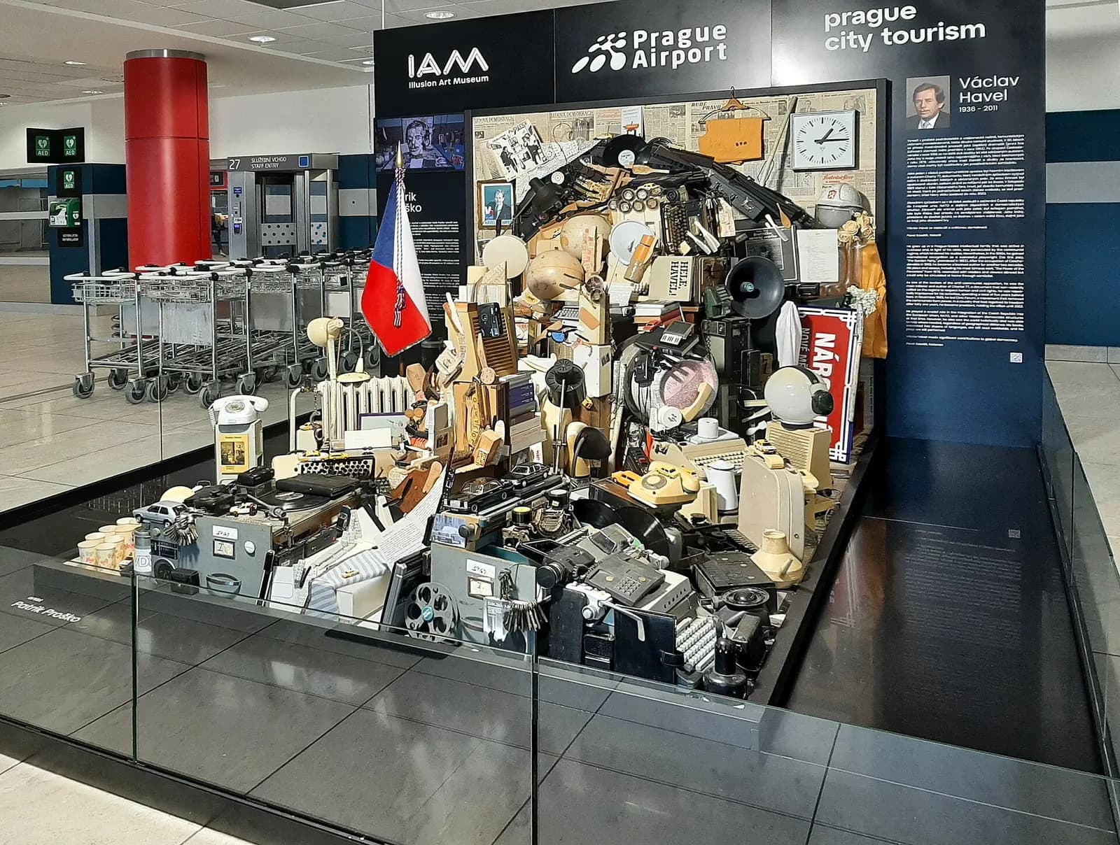 A sculpture of Václav Havel created from objects associated with him. Václav Havel Airport Prague , by Patrik Proško.