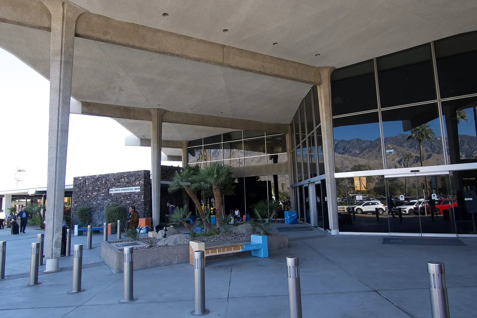 Palm Springs International Airport terminal interior seating and mid-century structure.