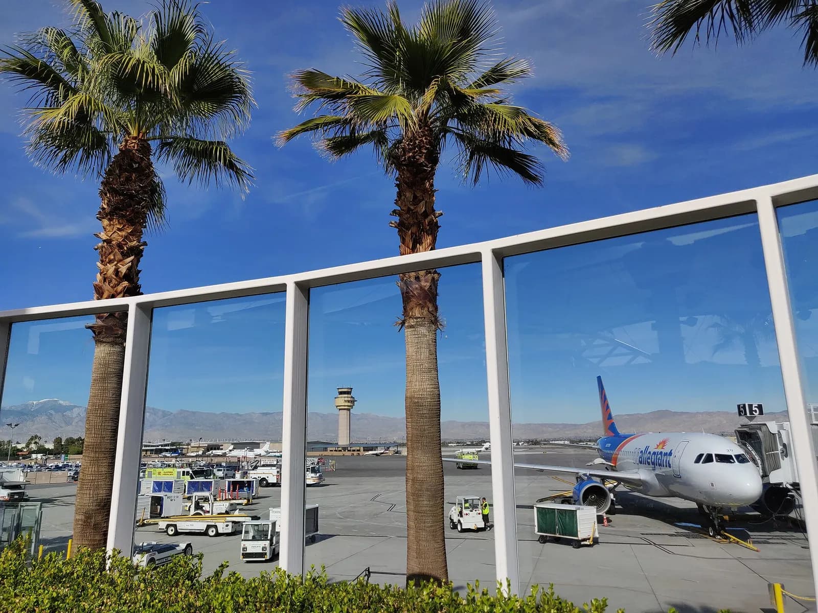 View from Palm Springs International Airport toward the tarmac and mountains.