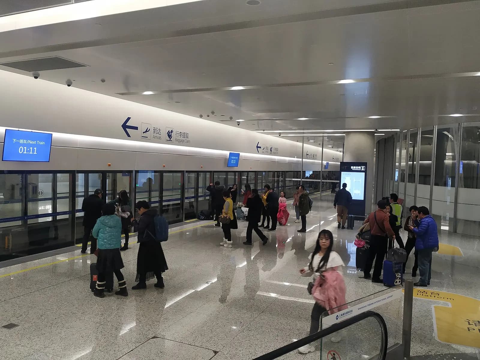 Automated people mover platform at the satellite terminal station with platform screen doors connecting to Terminal 2.