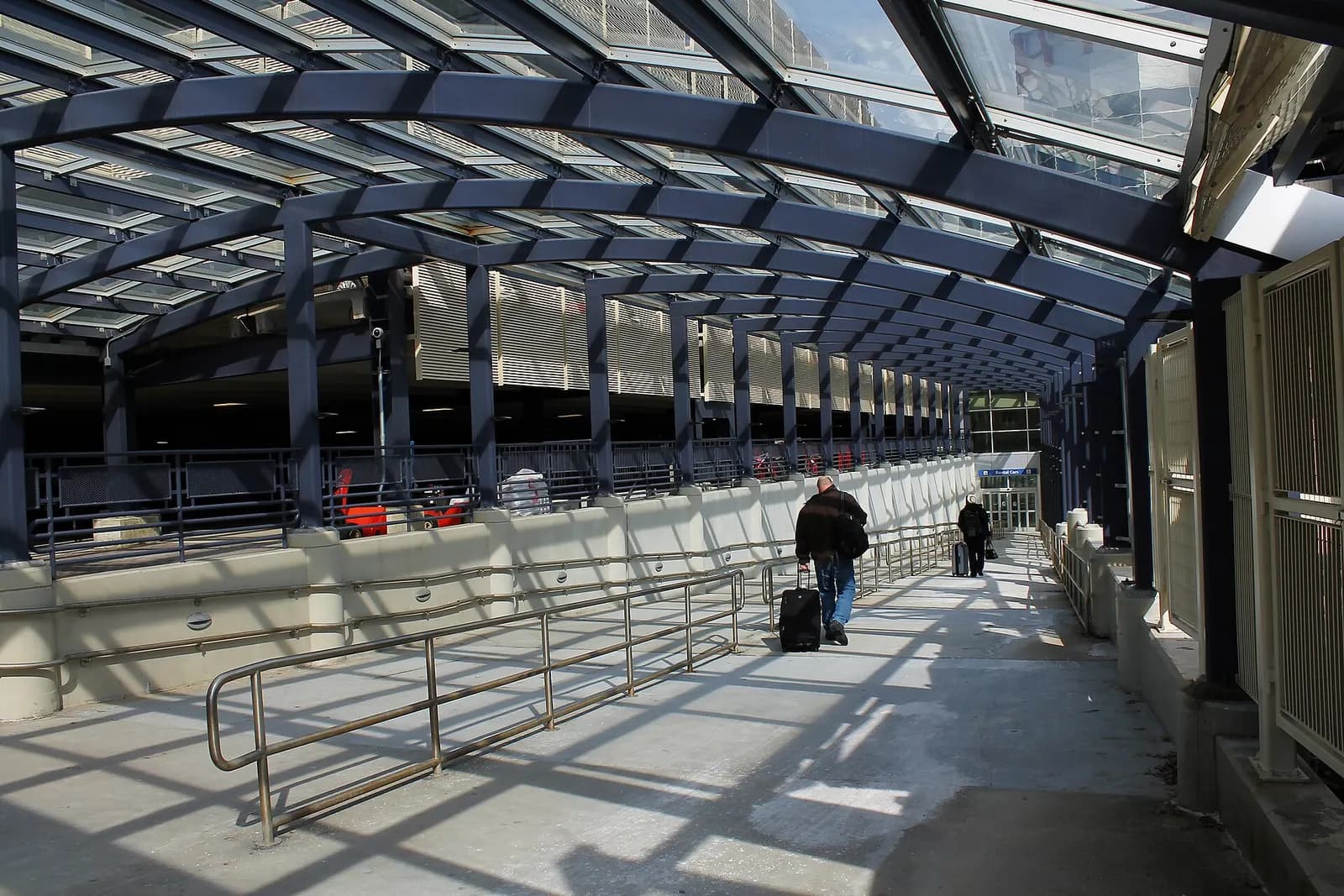 Covered walk between the Portland International Jetport terminal and the rental-car garage.