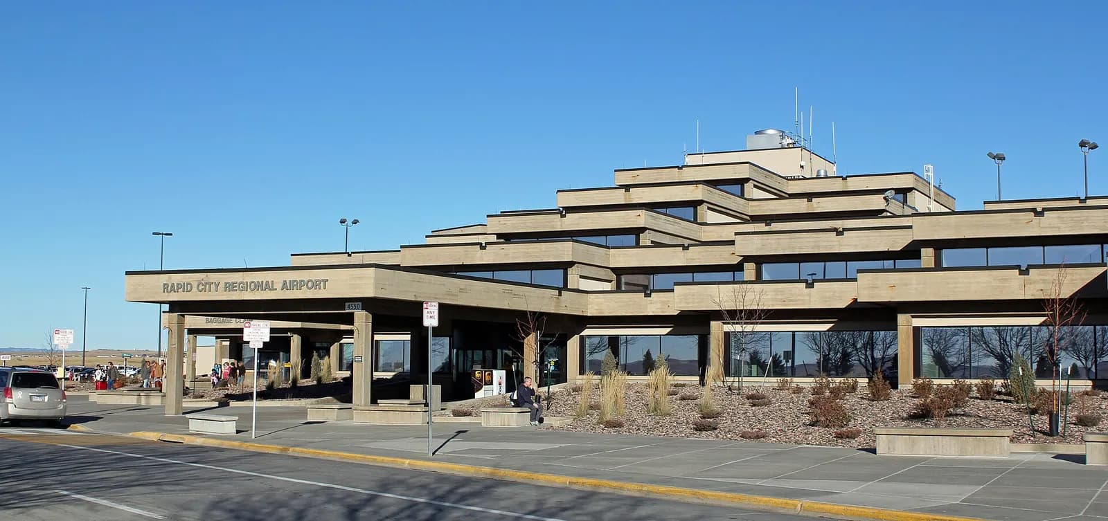 Historic 16 December 2010 view of the Rapid City Regional Airport passenger terminal from the approach road