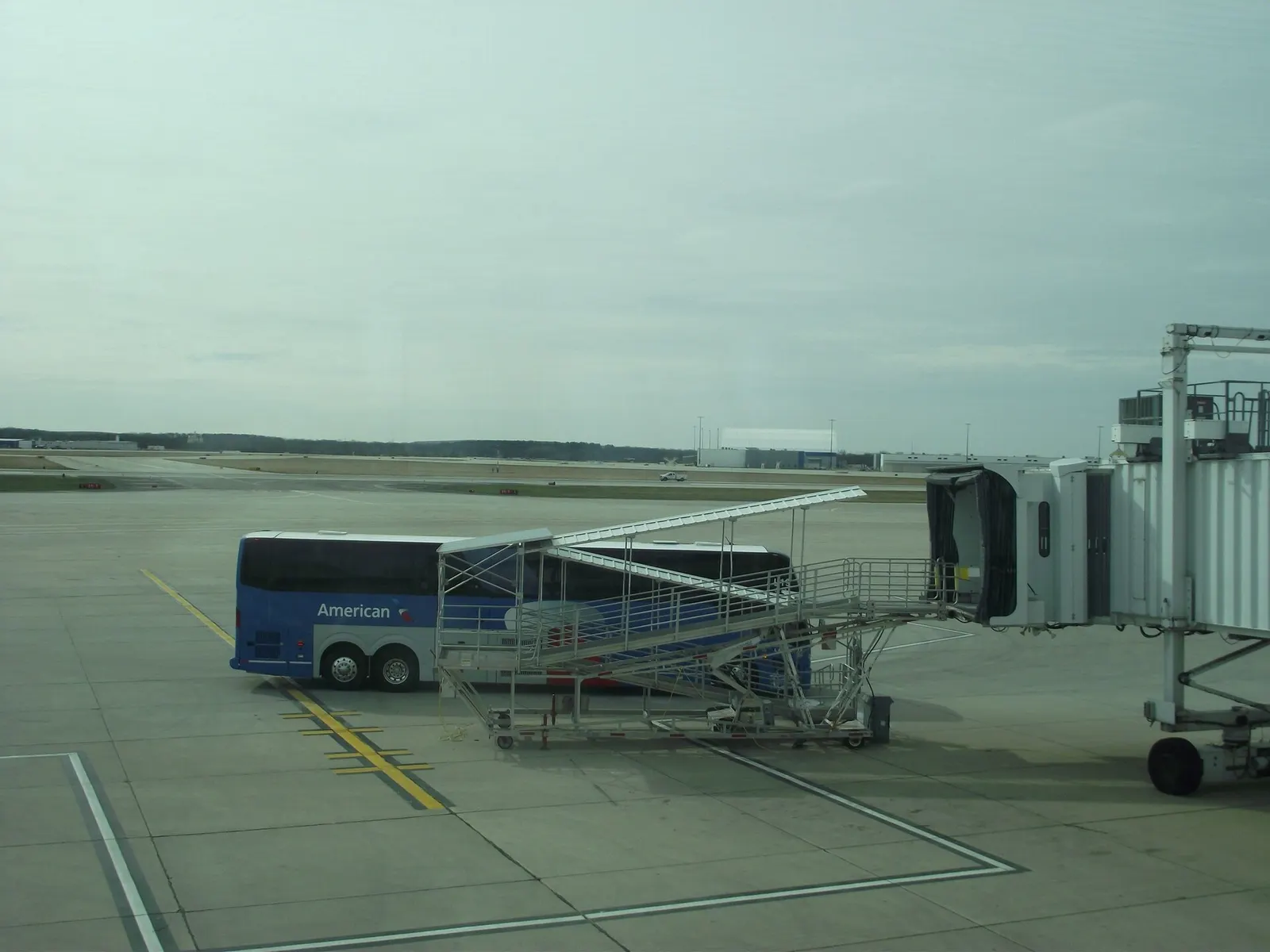 American Airlines Landline motorcoach parked airside at Chicago Rockford International Airport.