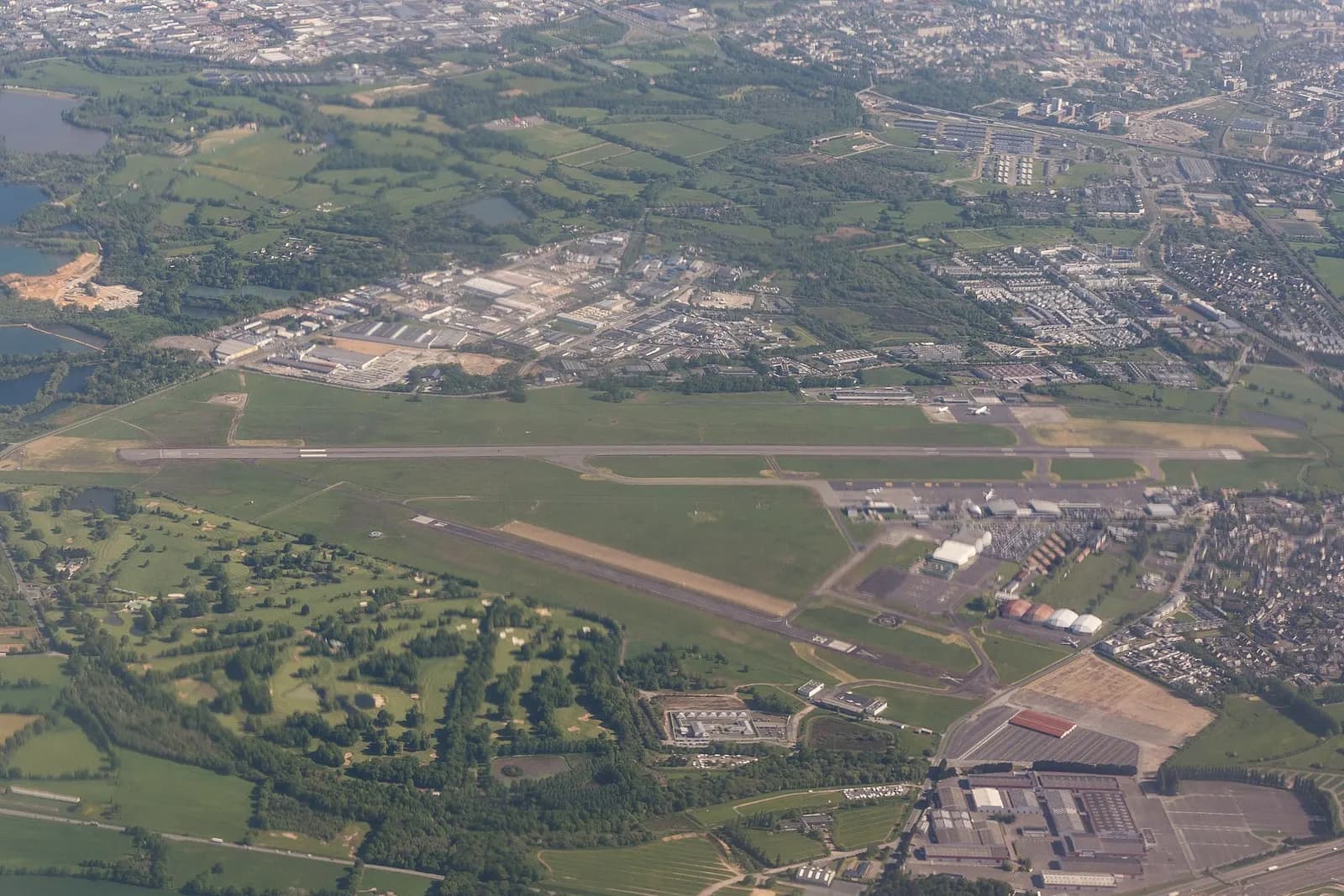 Aerial view of Rennes–Saint-Jacques Airport during a flight between RNS and CDG.