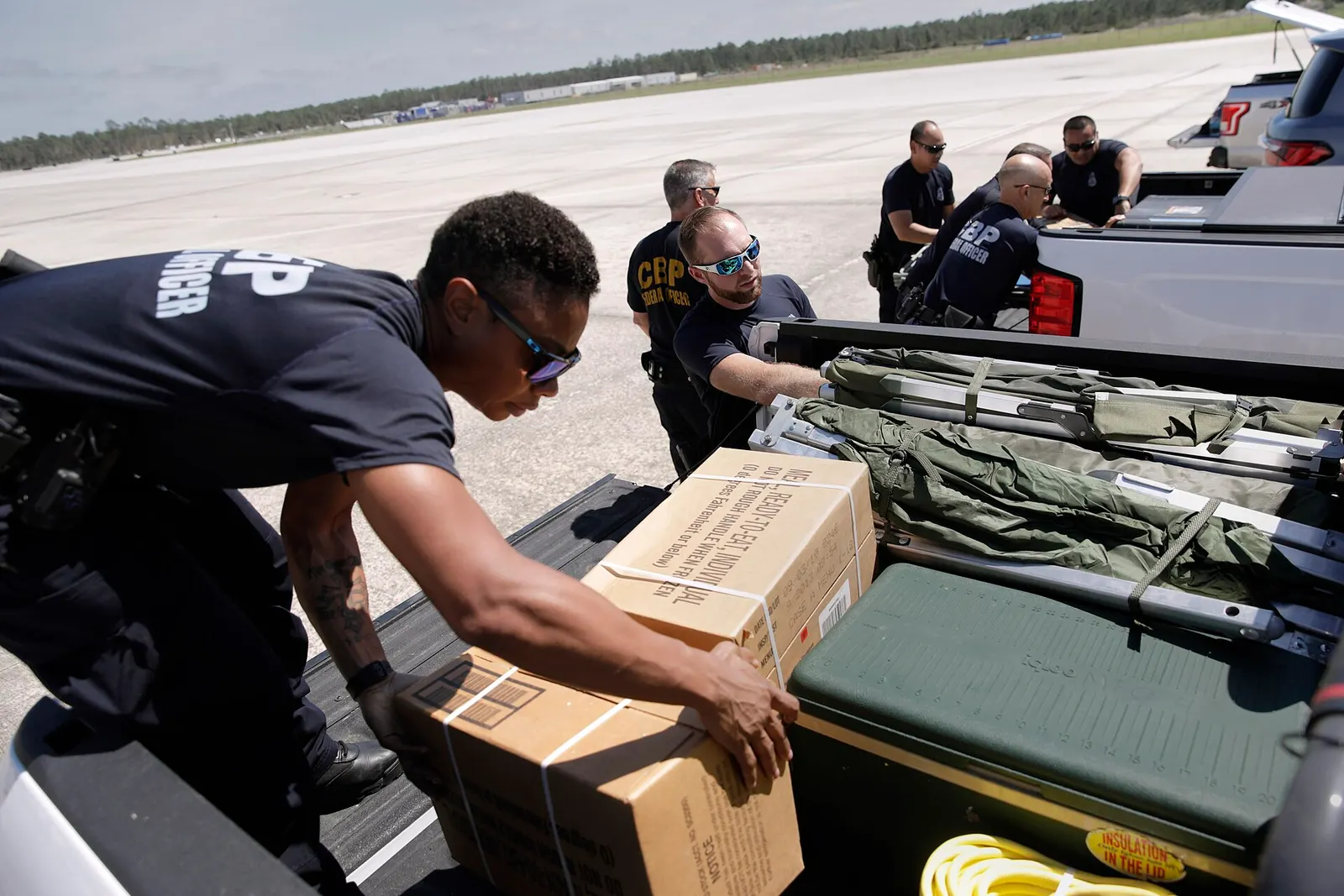 U.S. Customs and Border Protection officers with the Office of Field Operations pre-stage in at the Southwest Florida International Airport in Ft. Myers, Fla., and assist victims of Hurricane Ian near Venice, Fla., Sept. 29, 2022. CBP photo by Glenn Fawcett