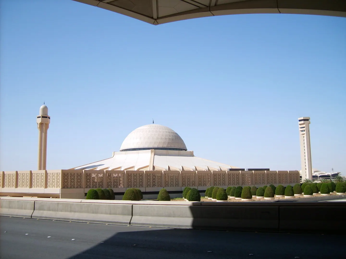 The King Khalid Airport Mosque with its minaret and prayer hall on the airport grounds.