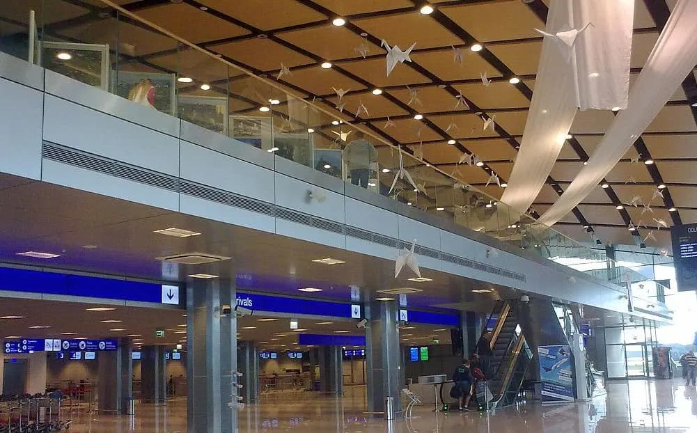Wide view of Rzeszów–Jasionka International Airport with the terminal in the centre