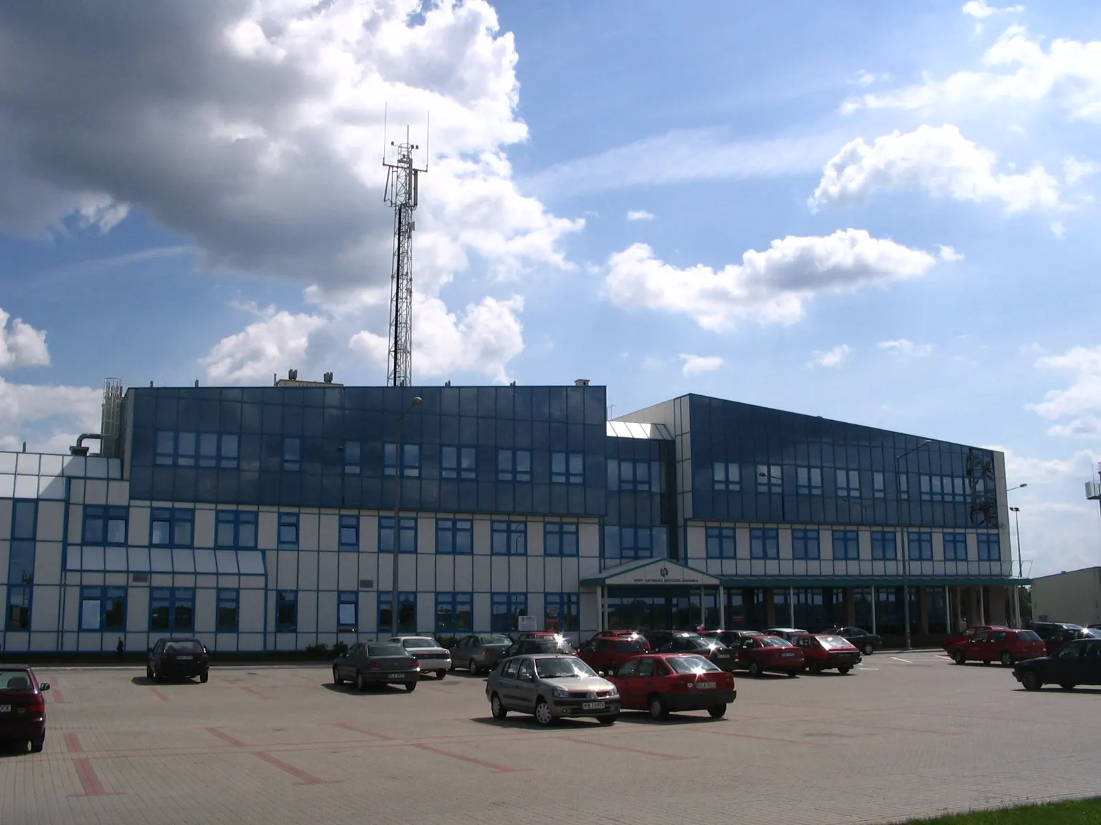 Main building of Rzeszów–Jasionka Airport from the approach road