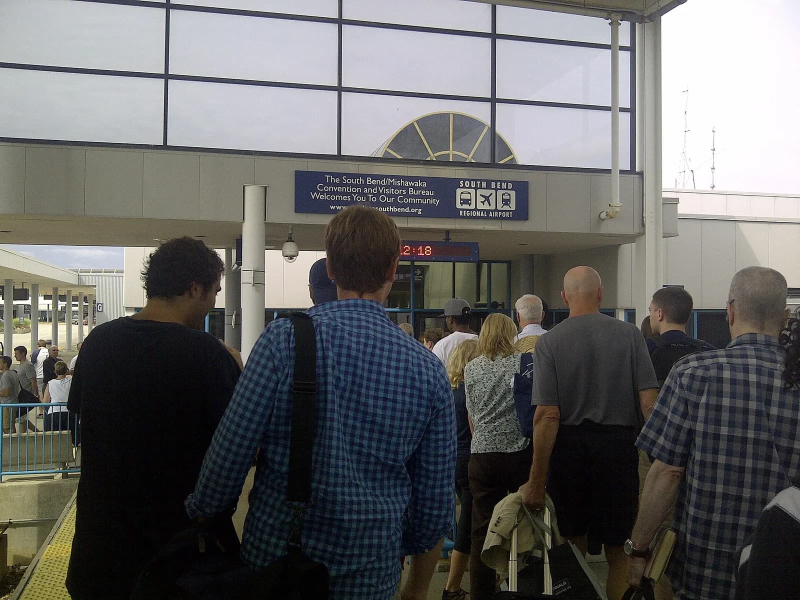 South Shore Line platform inside South Bend Airport packed with Notre Dame fans in August 2013