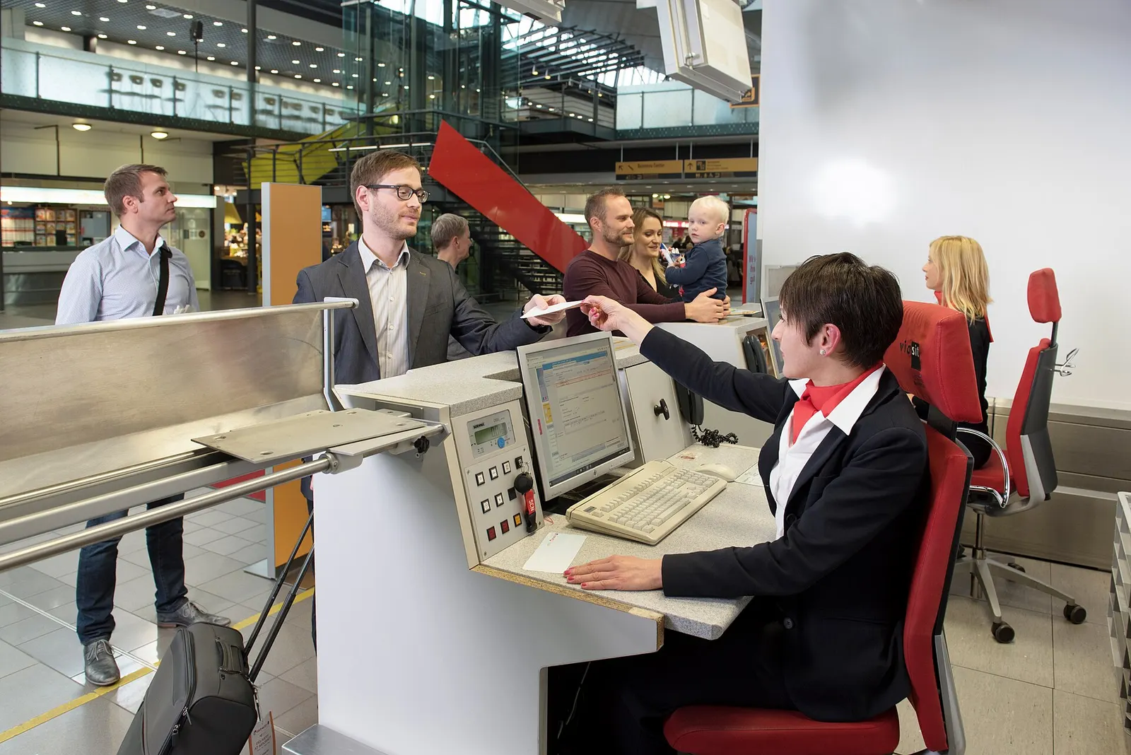 Passenger check-in area inside Saarbrücken Airport.