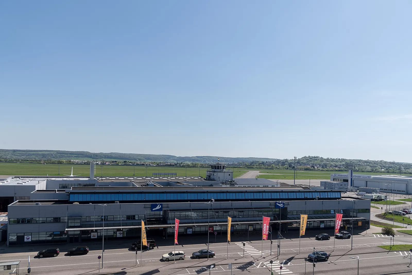 Front elevation of Saarbrücken Airport terminal from the landside curb.