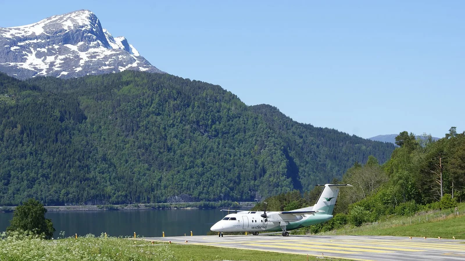 Widerøe de Havilland Canada Dash-8 103 at Sandane Airport, Sogn og Fjordane, Norway. Positioning for takeoff at the end of the runway.