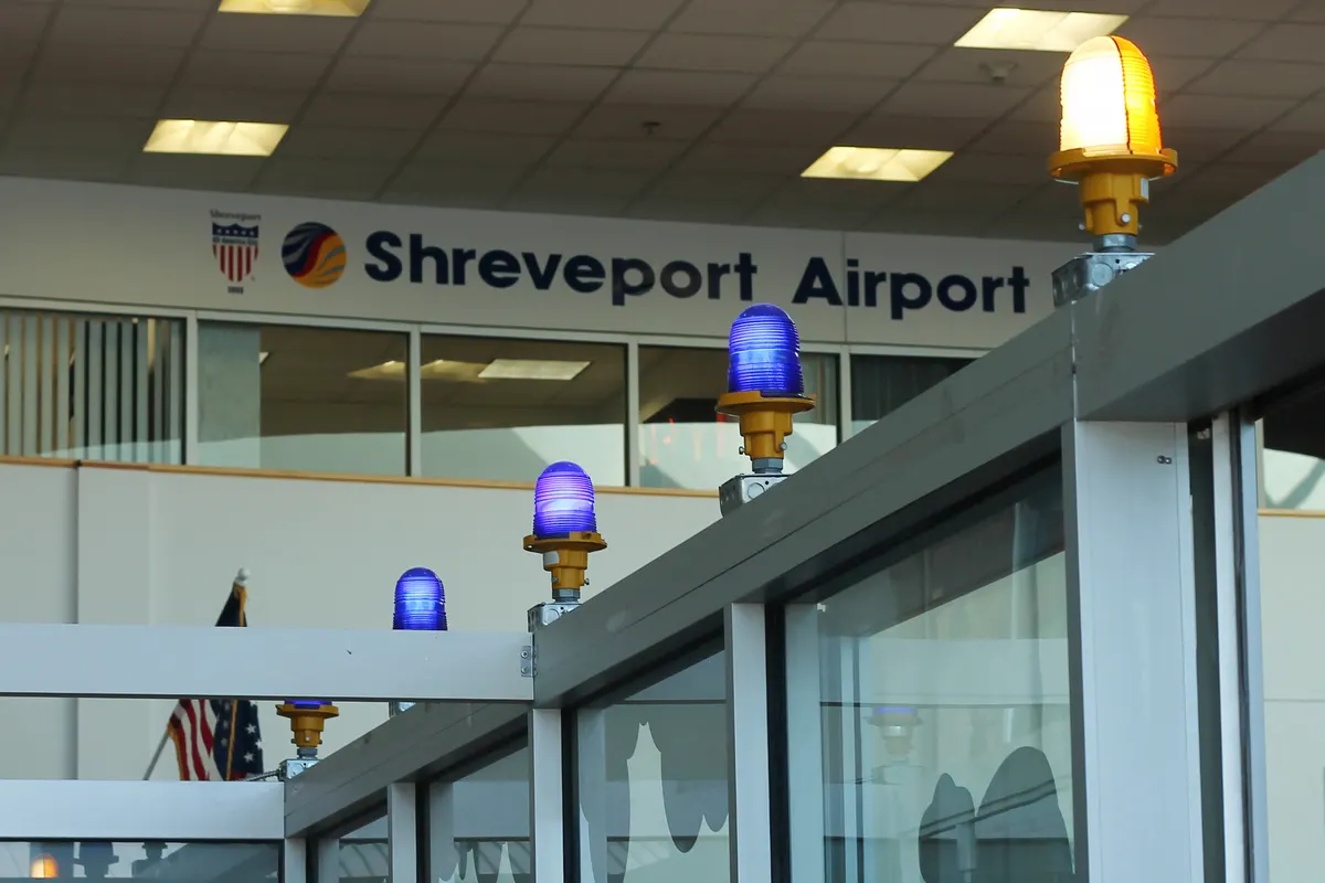 Historic 2014 interior lighting reused as waiting-area art at Shreveport Regional Airport