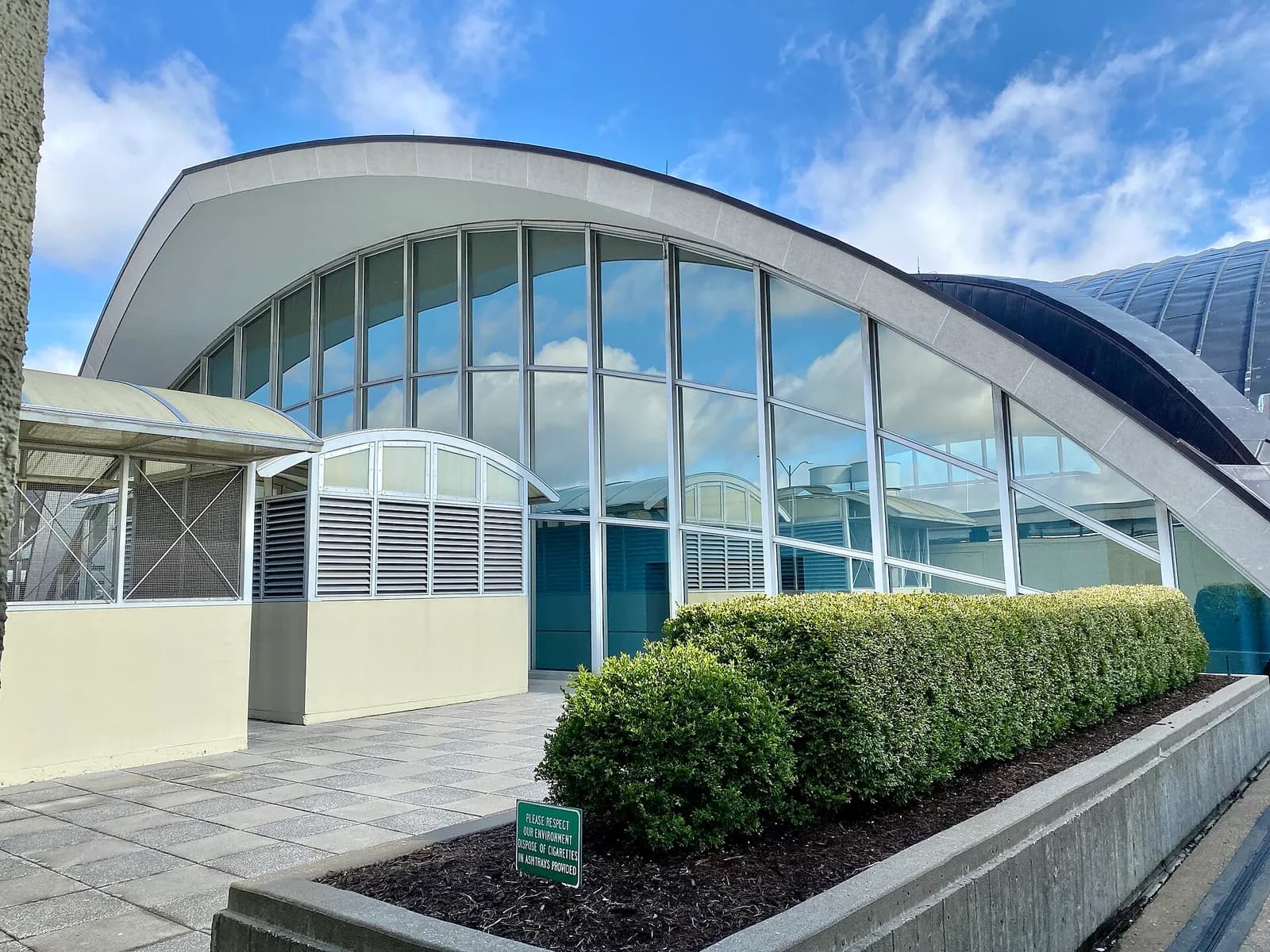 Built in 1953-1956, this Modern building was designed by Minoru Yamasaki to serve as the main airport terminal for St. Louis Lambert International Airport. The building was expanded in 1965 with a matching addition, expanding the main hall of the landslide head house of the terminal to its present s