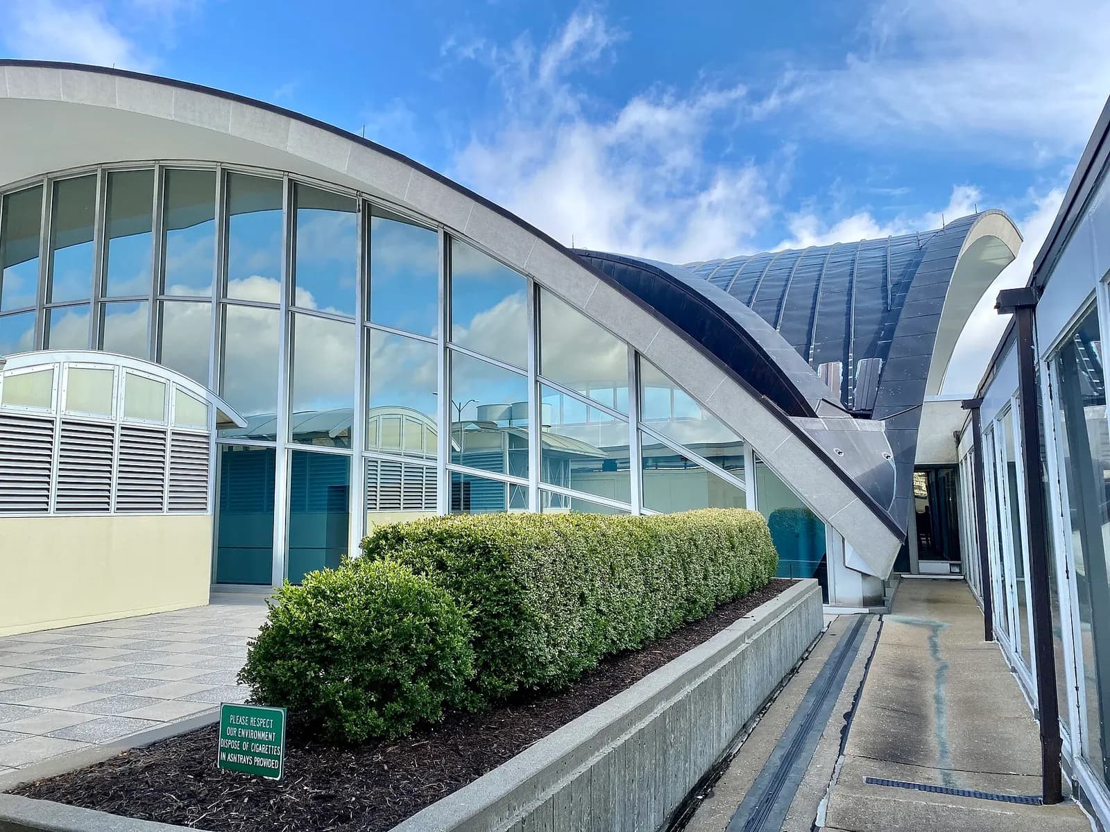 Built in 1953-1956, this Modern building was designed by Minoru Yamasaki to serve as the main airport terminal for St. Louis Lambert International Airport. The building was expanded in 1965 with a matching addition, expanding the main hall of the landslide head house of the terminal to its present s