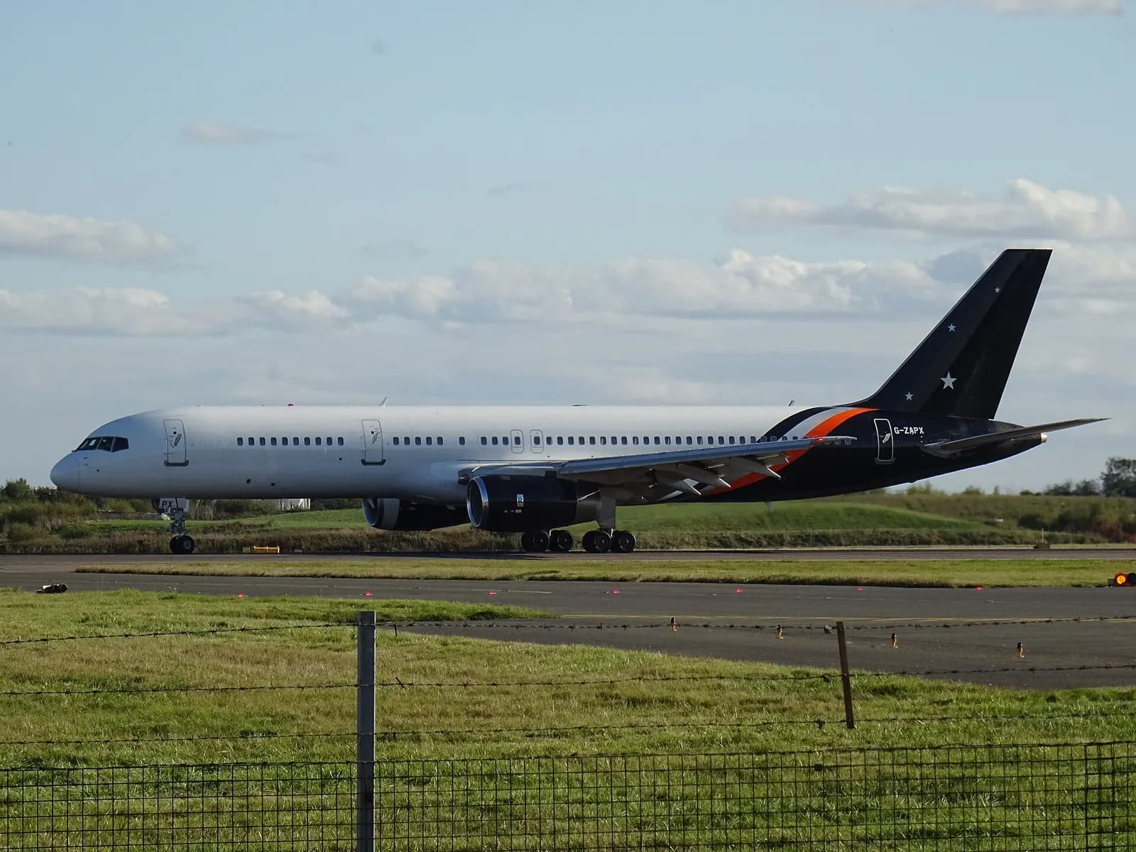 Titan Airways Boeing 757 G-ZAPX landing at Stansted from Heathrow, UK. 15th October 2021.