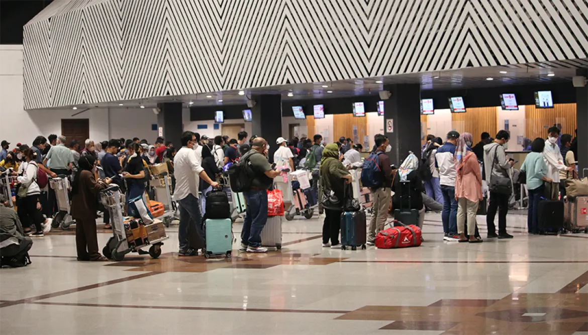Terminal 1 check-in hall at Juanda International Airport with black-and-white Parang batik bulkhead