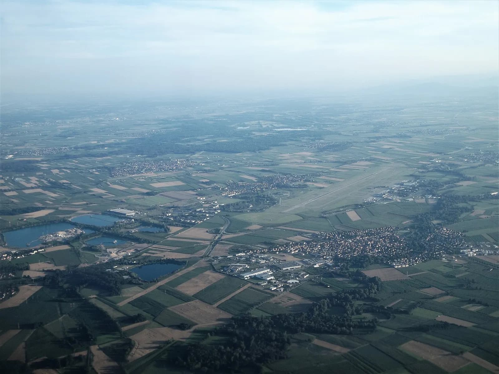 Aerial view of Strasbourg-Entzheim Airport runway and terminal campus