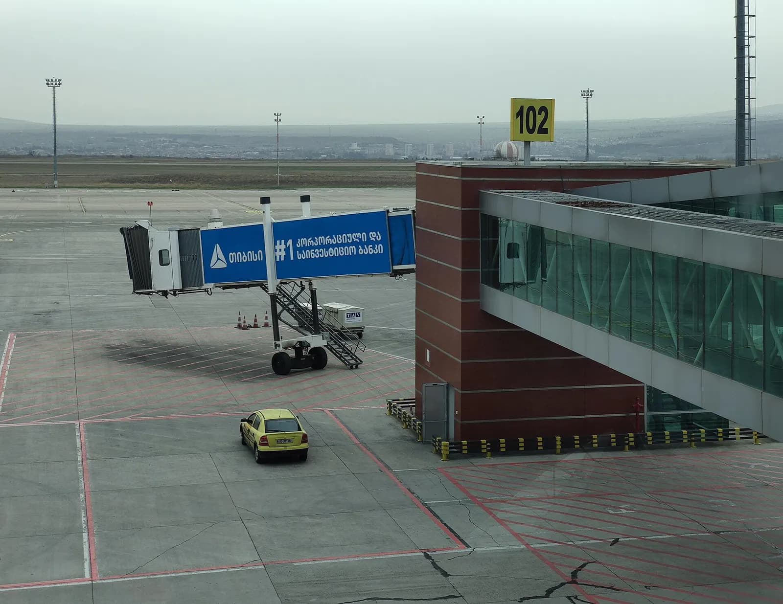 Photo of the Gate №102 from the Tbilisi International Airport Terminal in Georgia