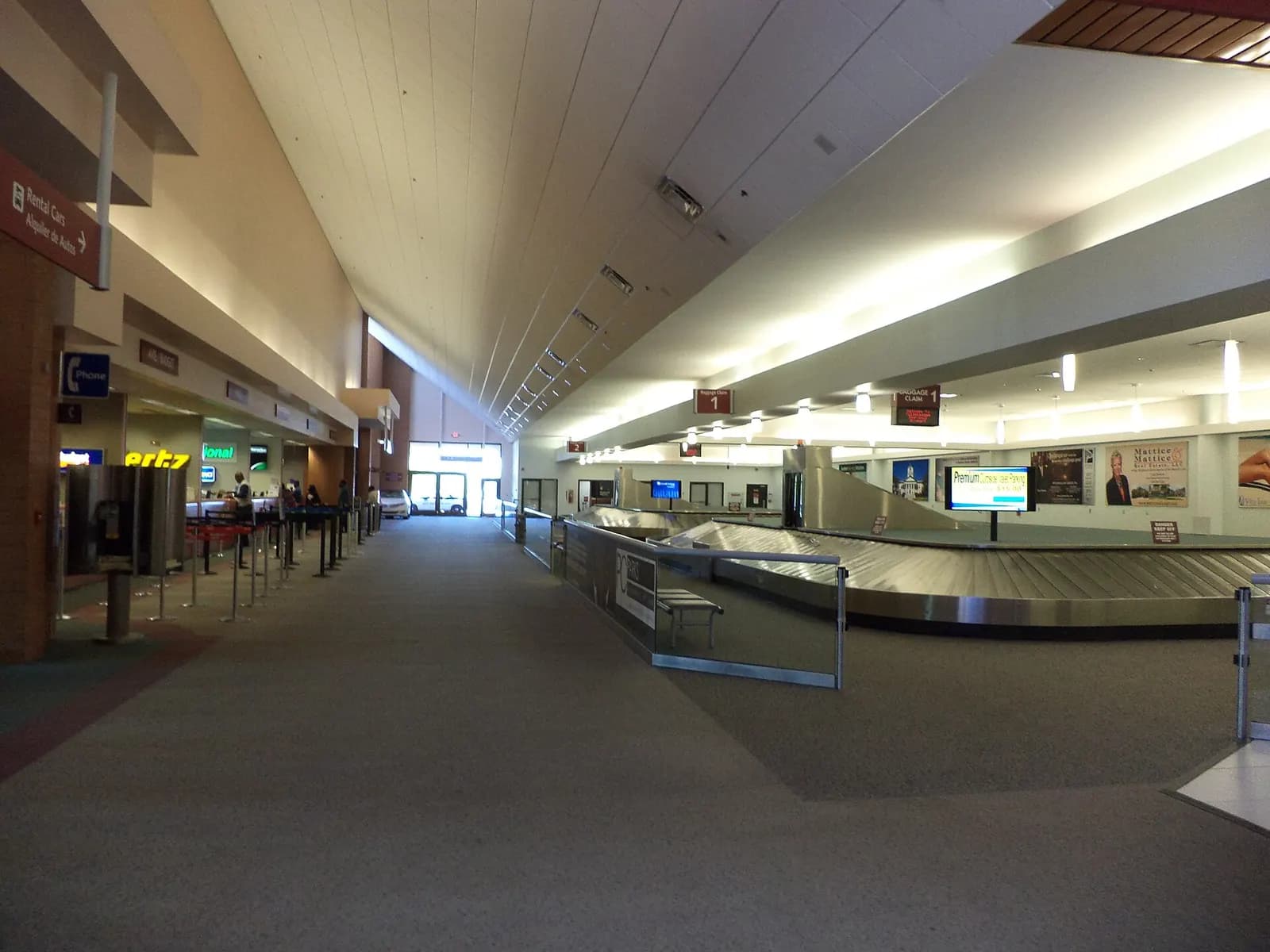 Baggage-claim hall with rental-car counters at Tallahassee International Airport, photographed 26 October 2013.
