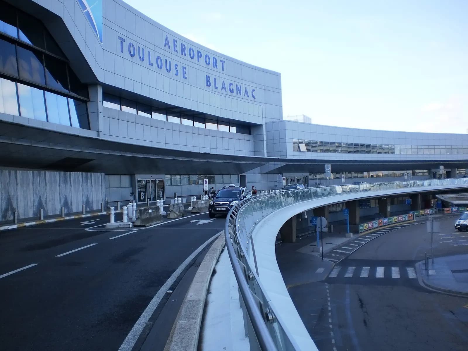 Terminal building exterior at Toulouse-Blagnac Airport.