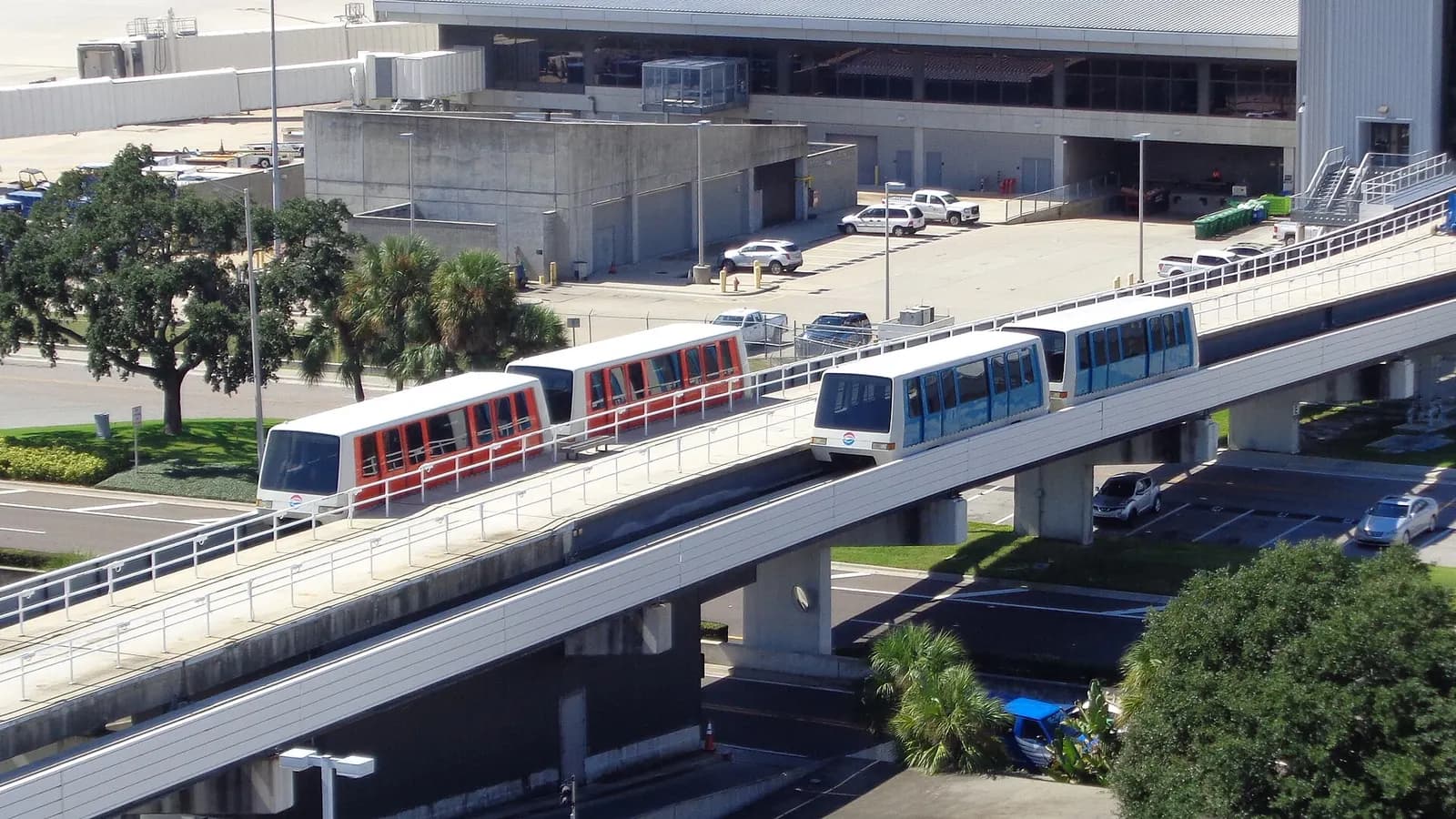 Parallel people mover tracks and stations at the Airside E concourse at Tampa International Airport.