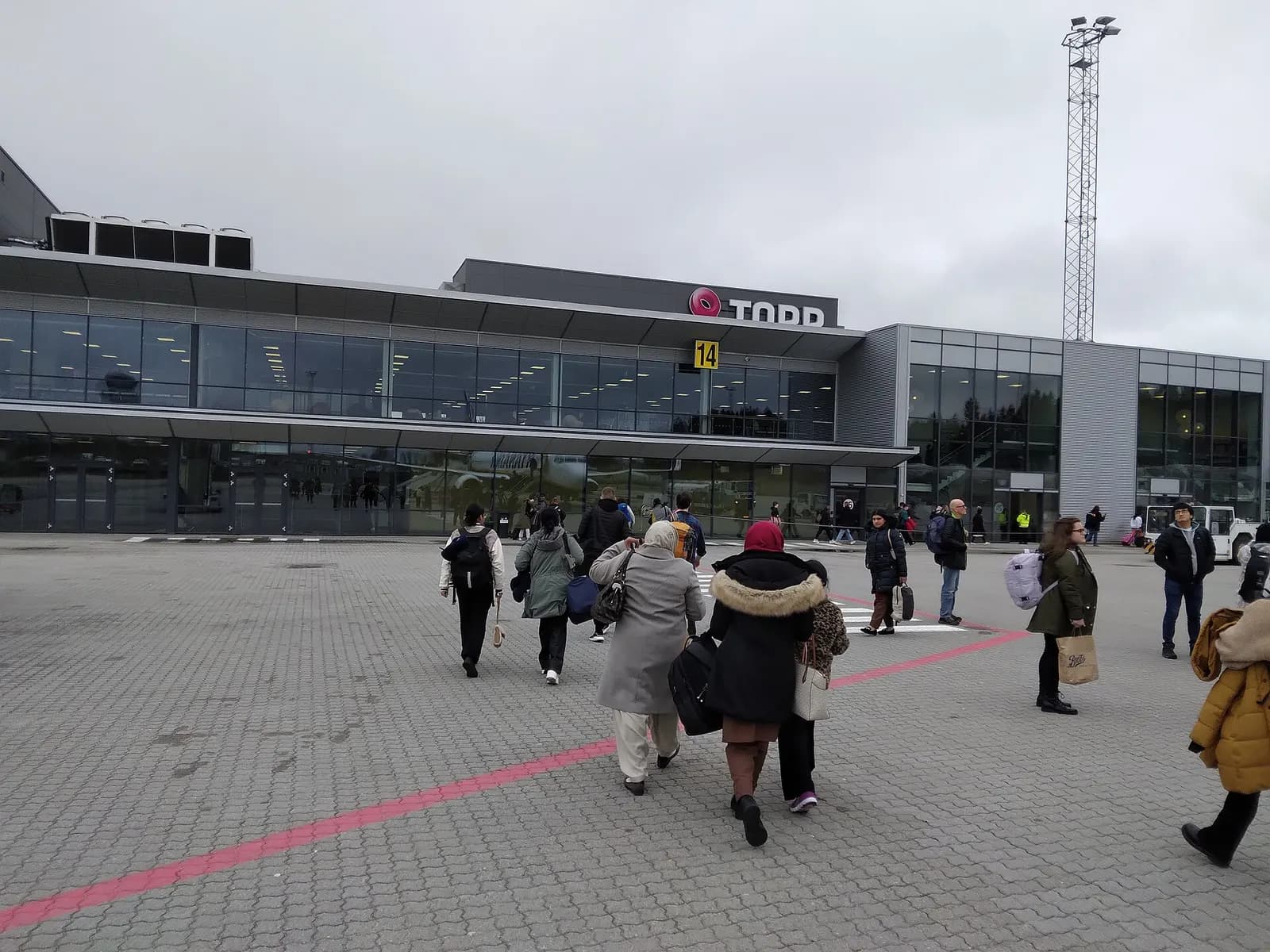 Passengers walking into Sandefjord Airport, Torp off a plane which has just landed from Manchester