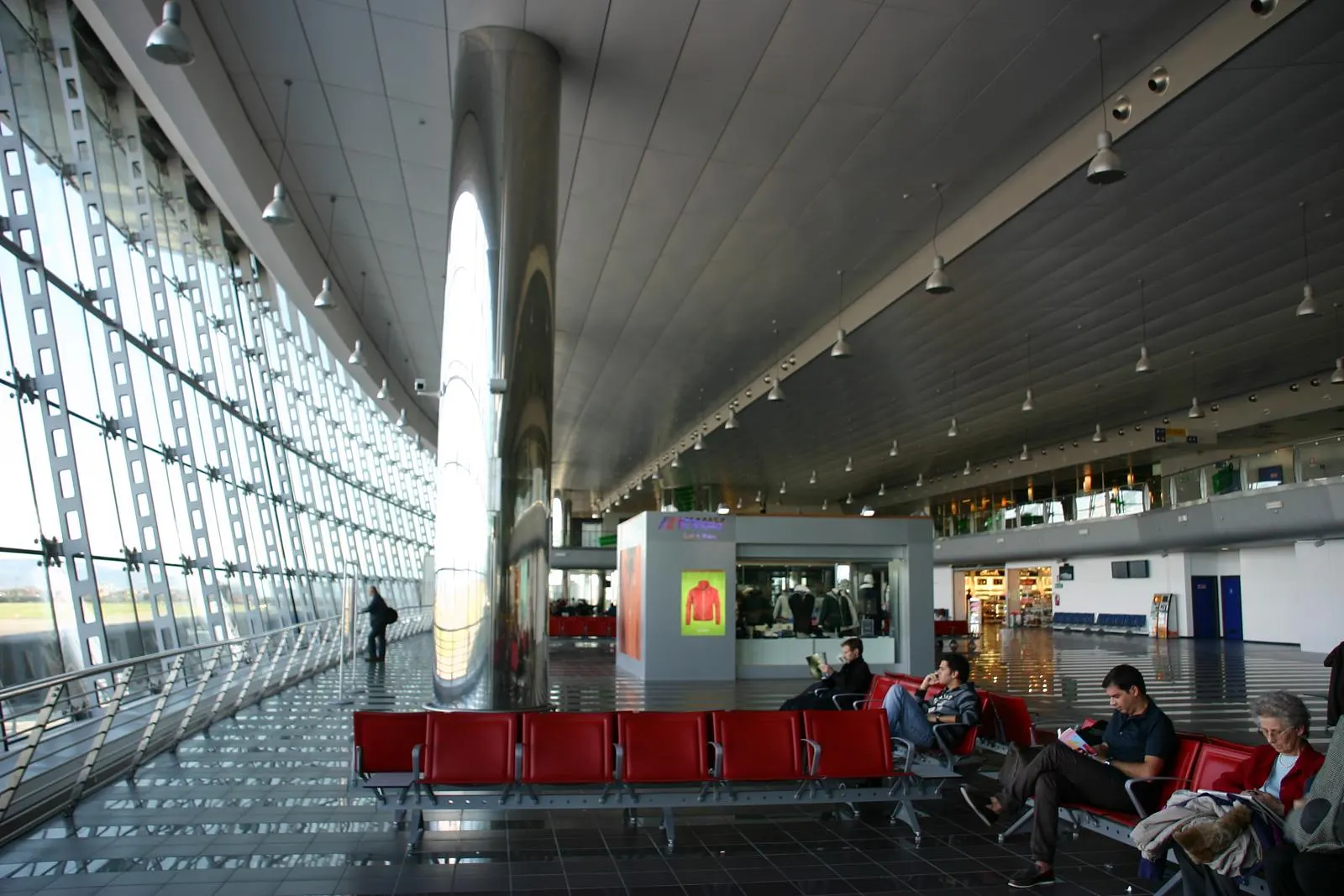 Turin Airport terminal building under clear skies