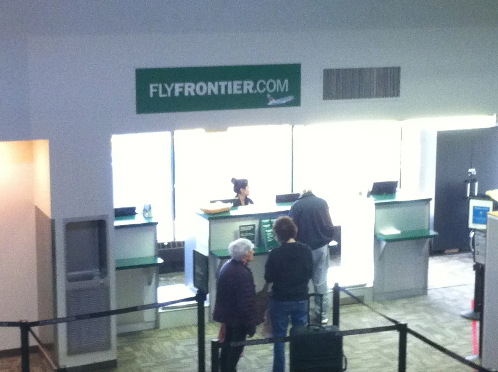 Frontier Airlines check-in counter in the Trenton-Mercer ticketing lobby.