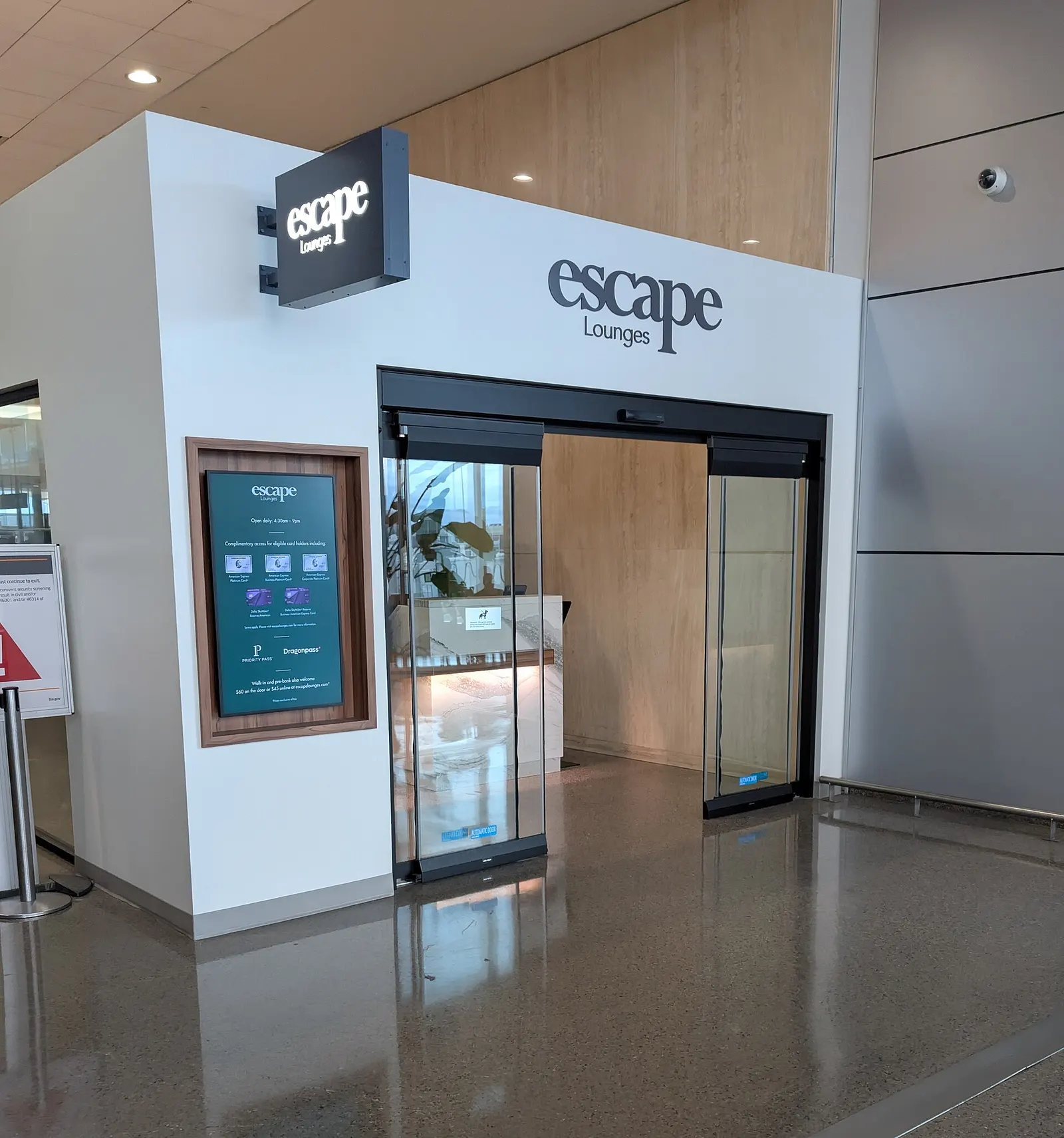 Escape Lounge entrance immediately after security at Tulsa International Airport in October 2025.
