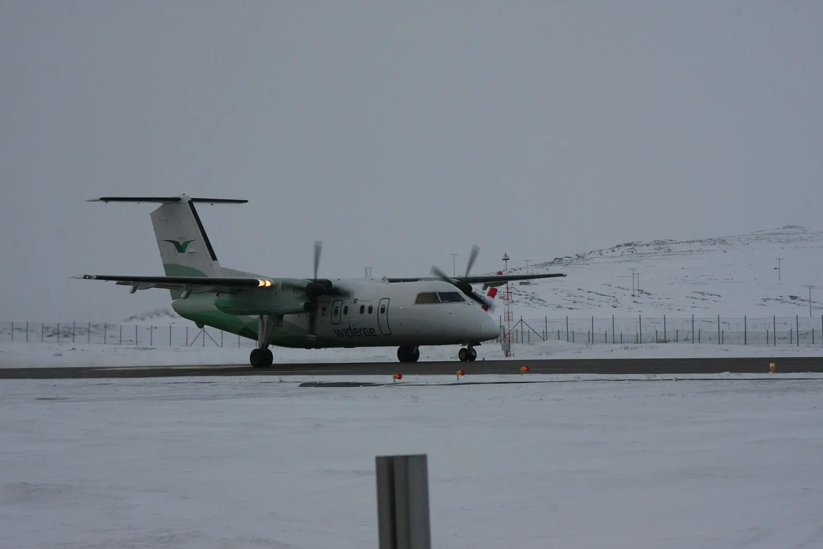 Widerøe Dash 8-100 on the apron at Vardø Airport, Svartnes