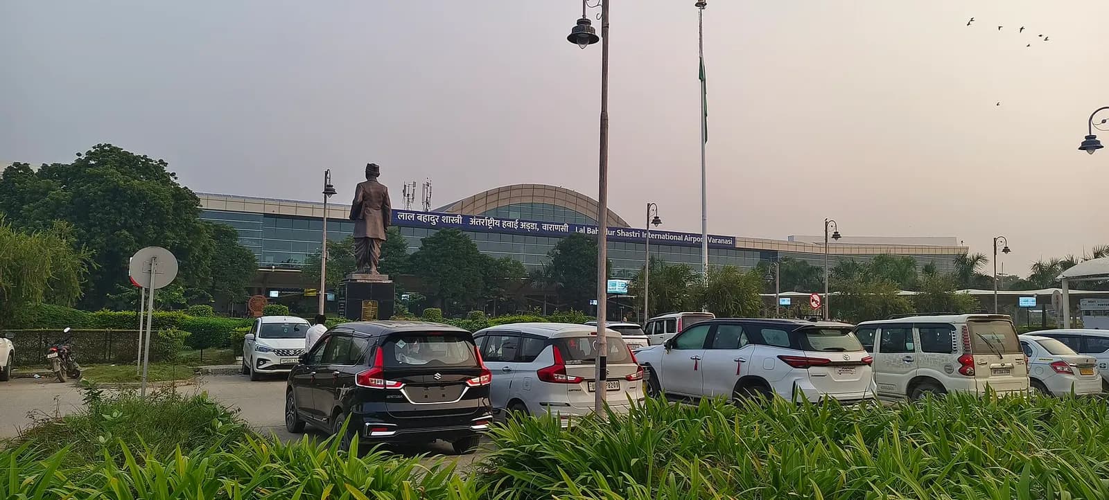 A airport with statue of our nation's farmer son