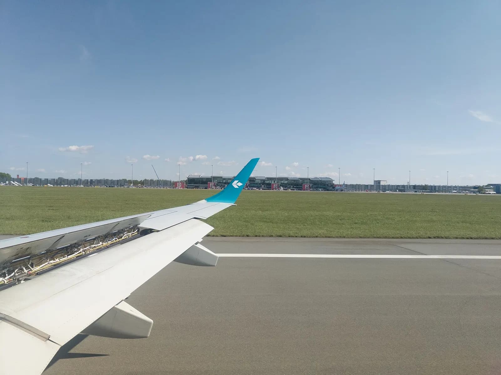 Wrocław Airport terminal exterior photographed in April 2024.