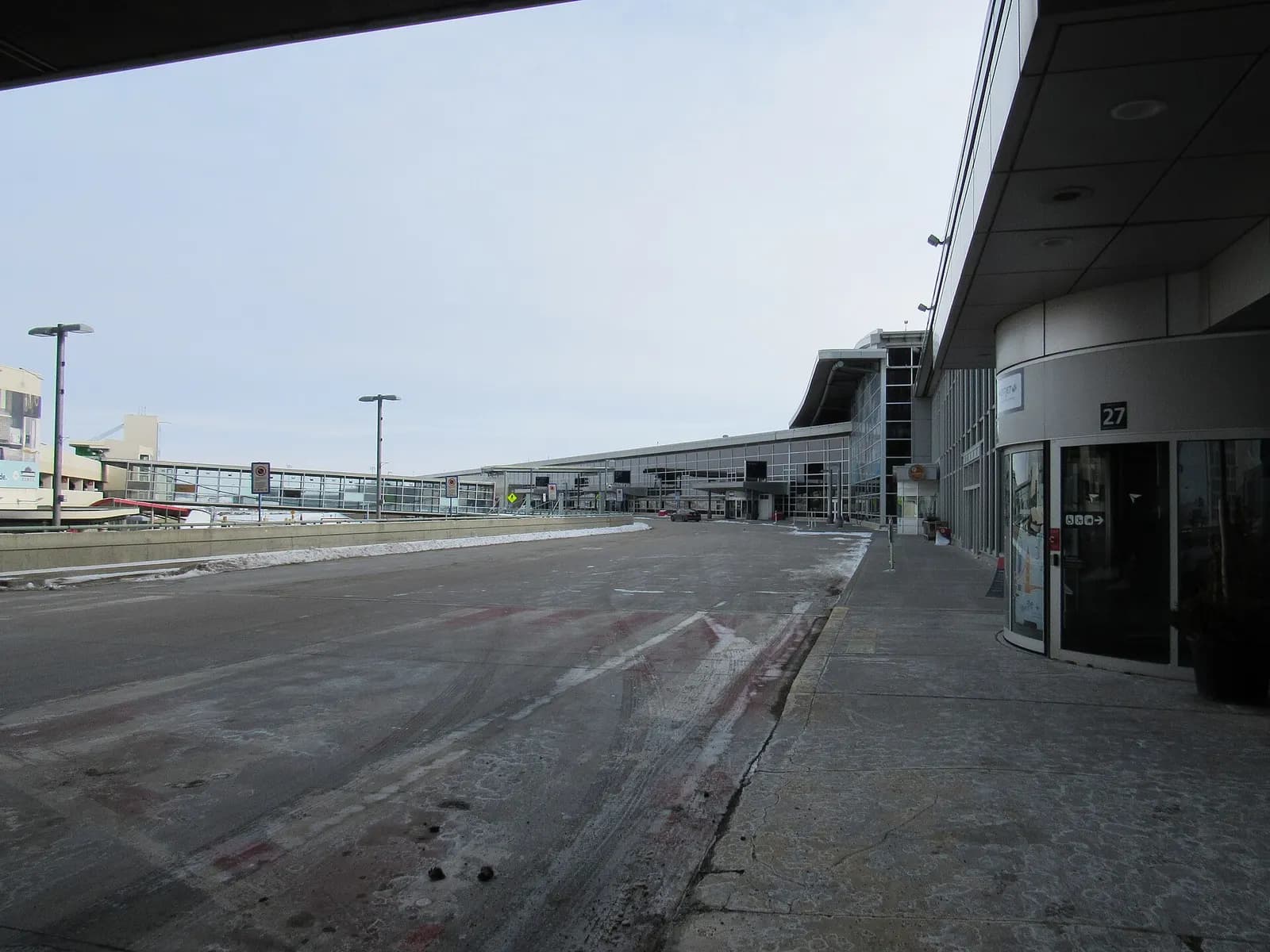 Landside departure curb in front of the main Edmonton International Airport terminal
