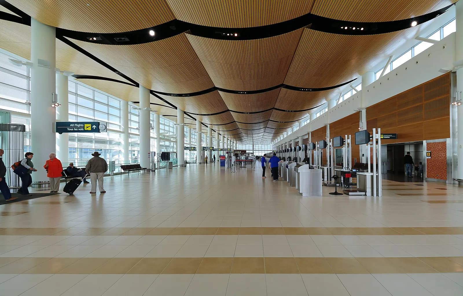 Check-in hall under the wave wood ceiling at Winnipeg Richardson International Airport