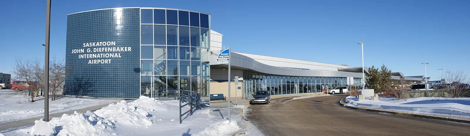Wide exterior of the Saskatoon civil terminal and curb canopy in January 2009, before the later air-terminal expansion.
