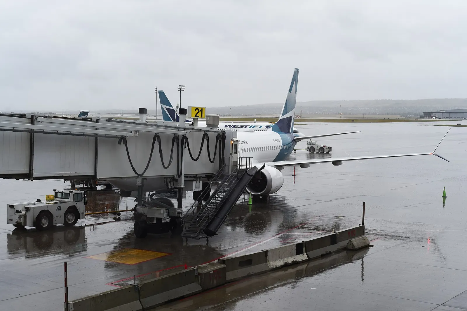 A view of a WestJet aircraft Boeing 737-8 after arrival at Calgary International Airport on the flight WS 657 (YYZ T3 Toronto 11:00 - YYC Calgary Intl 13:15)