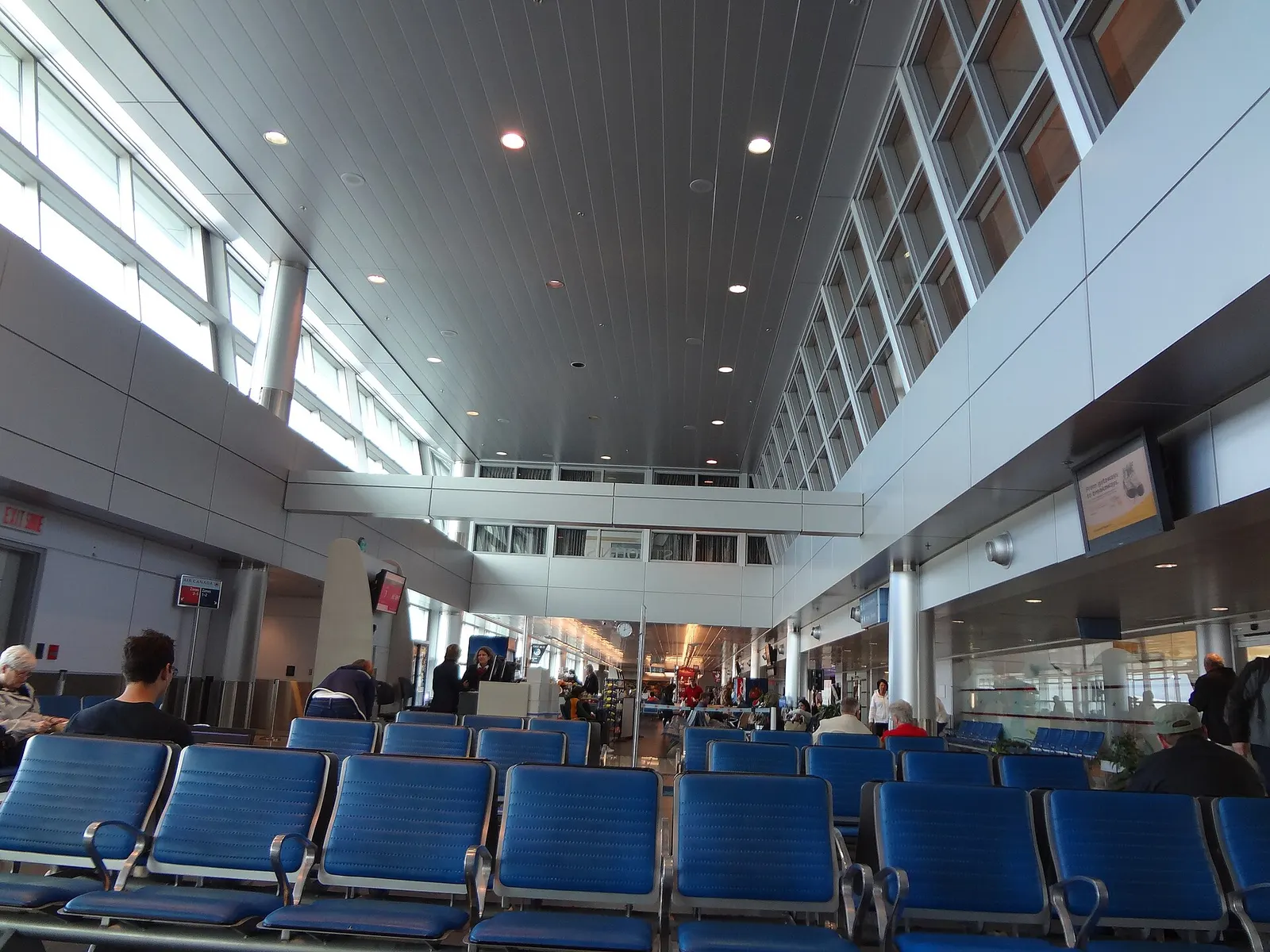 Exterior of St. John's International Airport showing the passenger terminal and forecourt, June 2016.