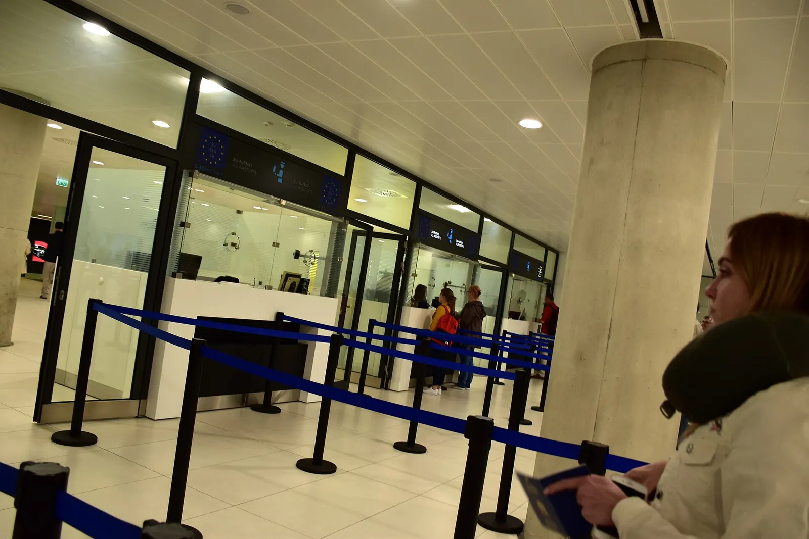 Passport control hall in arrivals area of Zagreb Franjo Tuđman Airport .