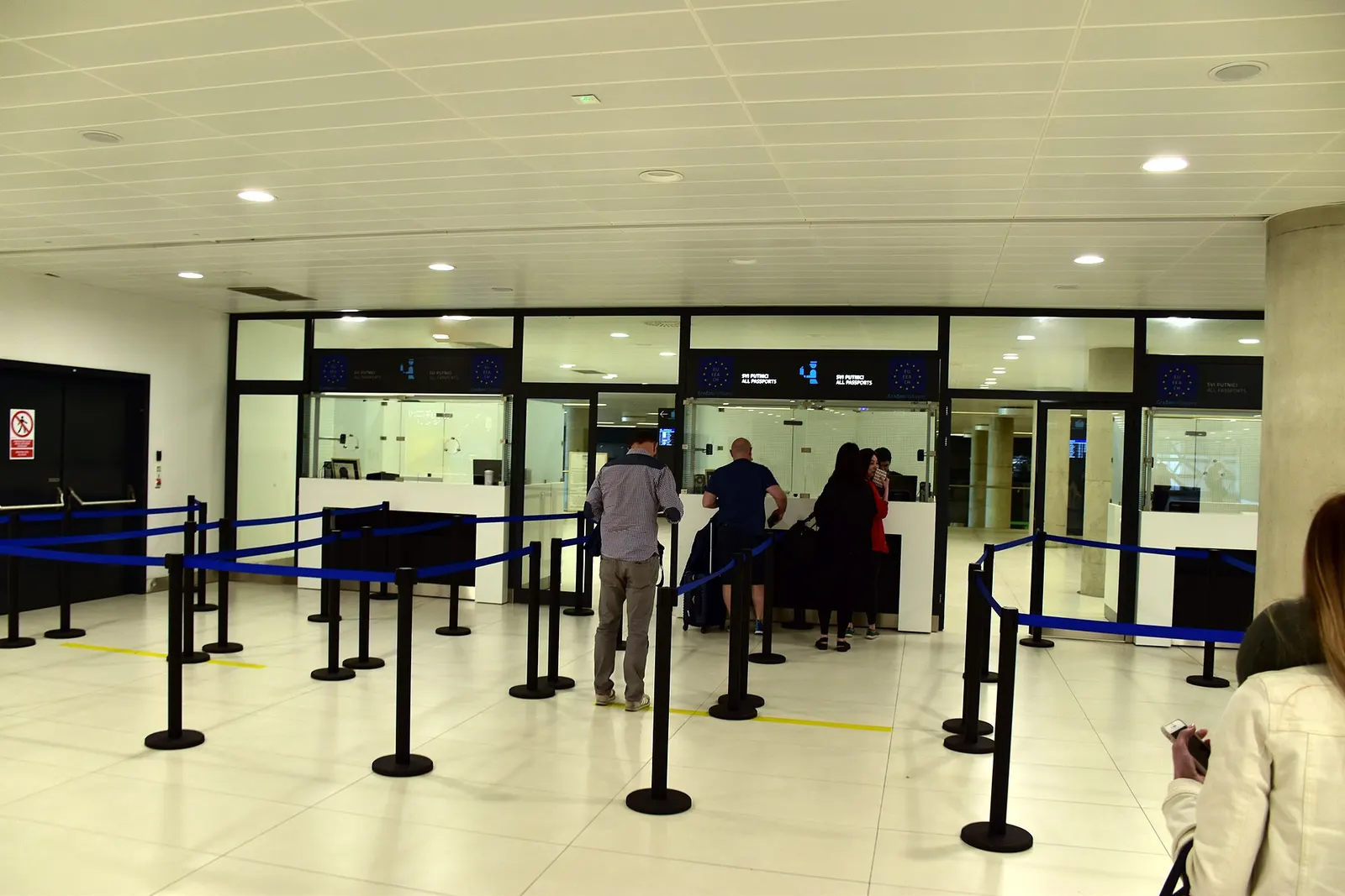 Passport control hall in arrivals area of Zagreb Franjo Tuđman Airport .